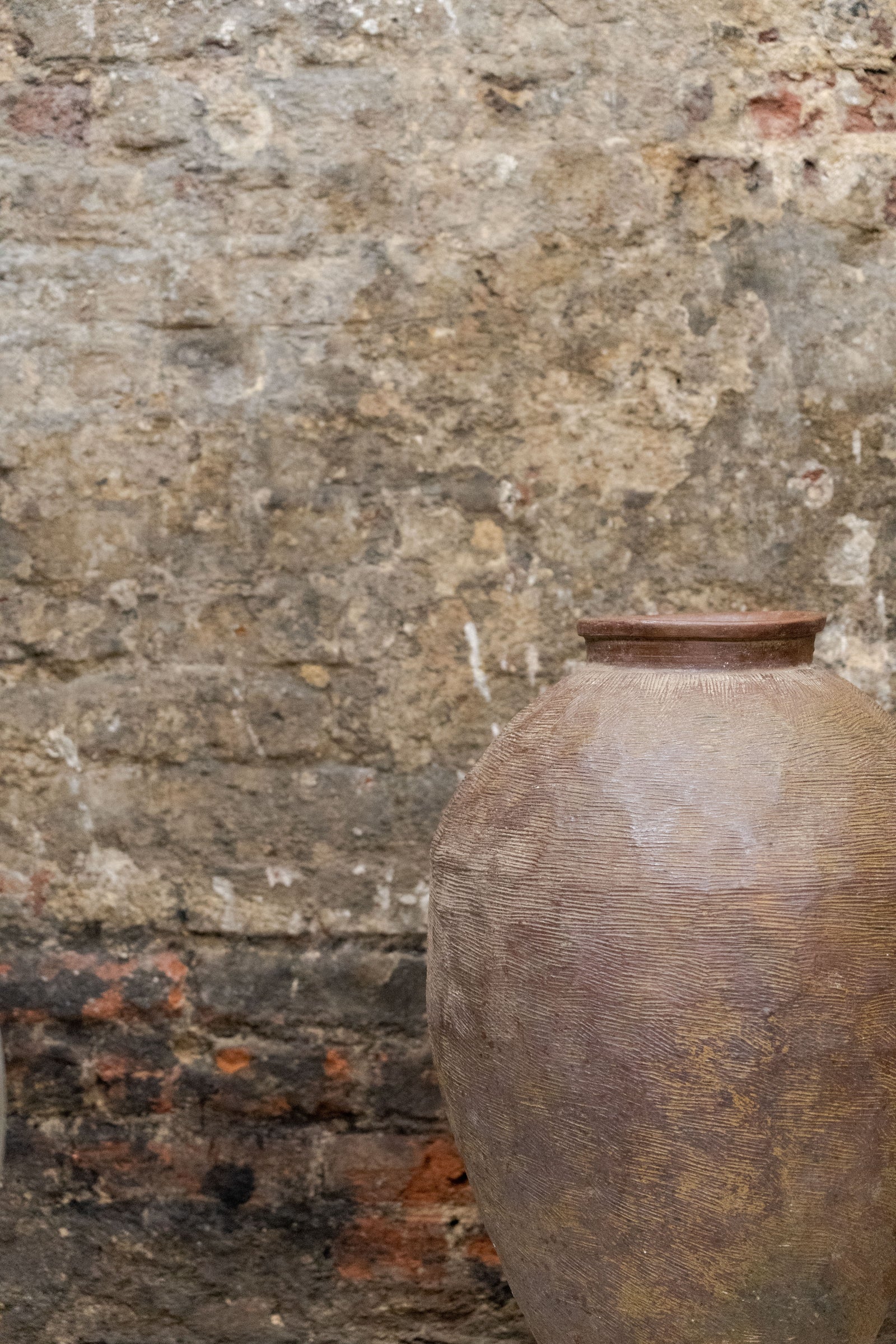 Vintage brown Asian pot — side view