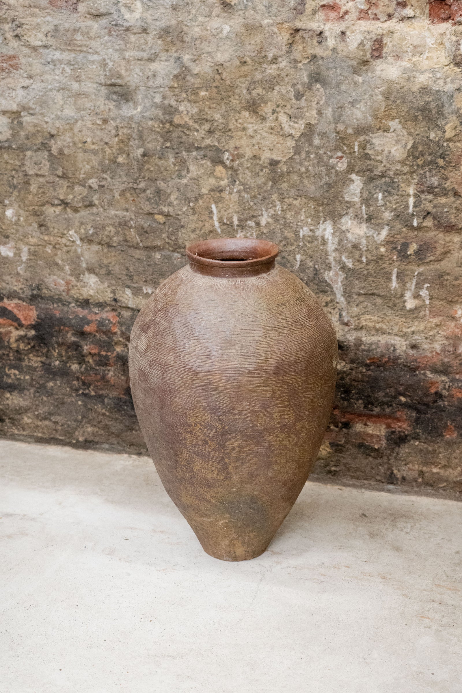 Tall vintage brown Asian pot with aged earthy patina