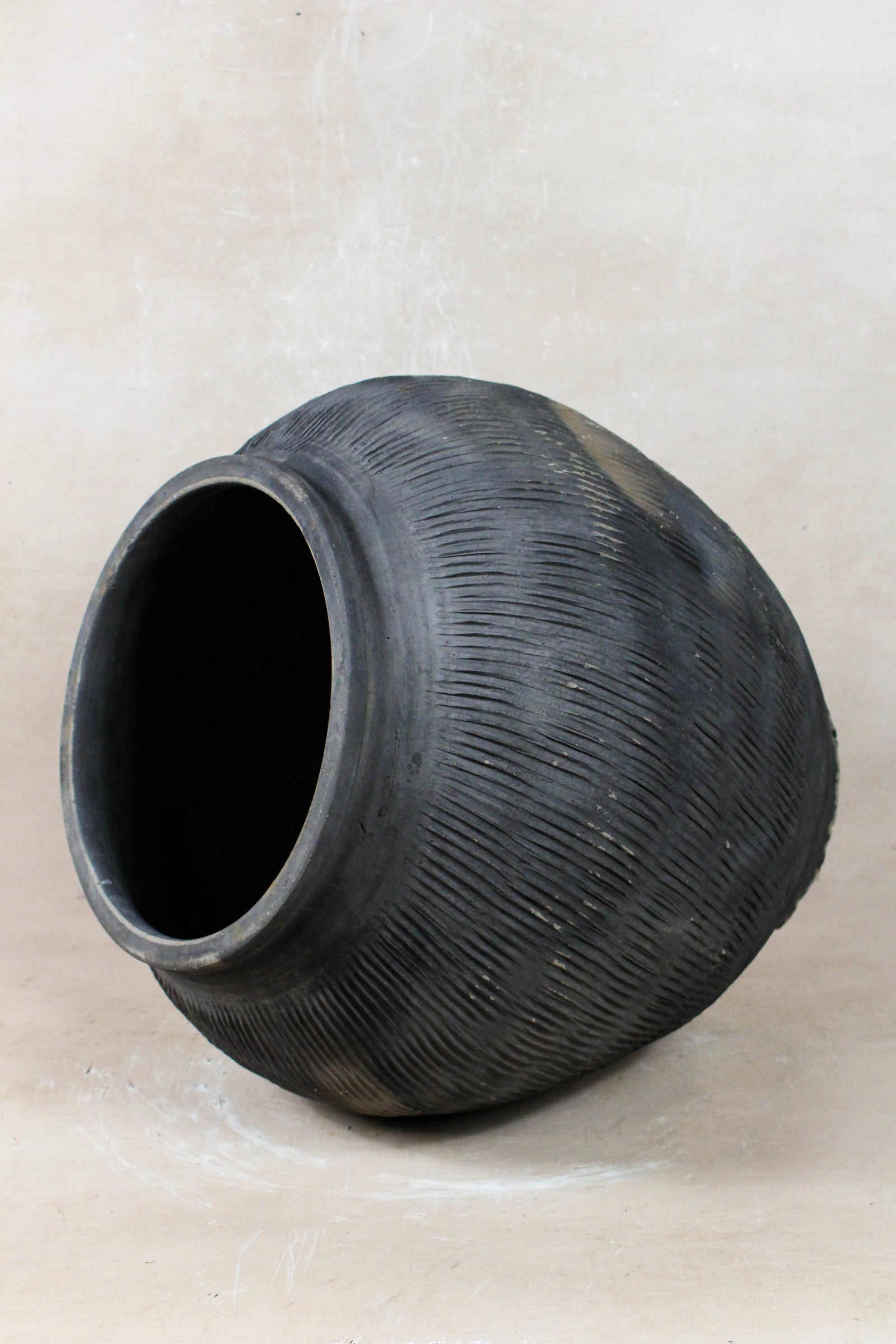 Vintage grey clay pot — opening from above