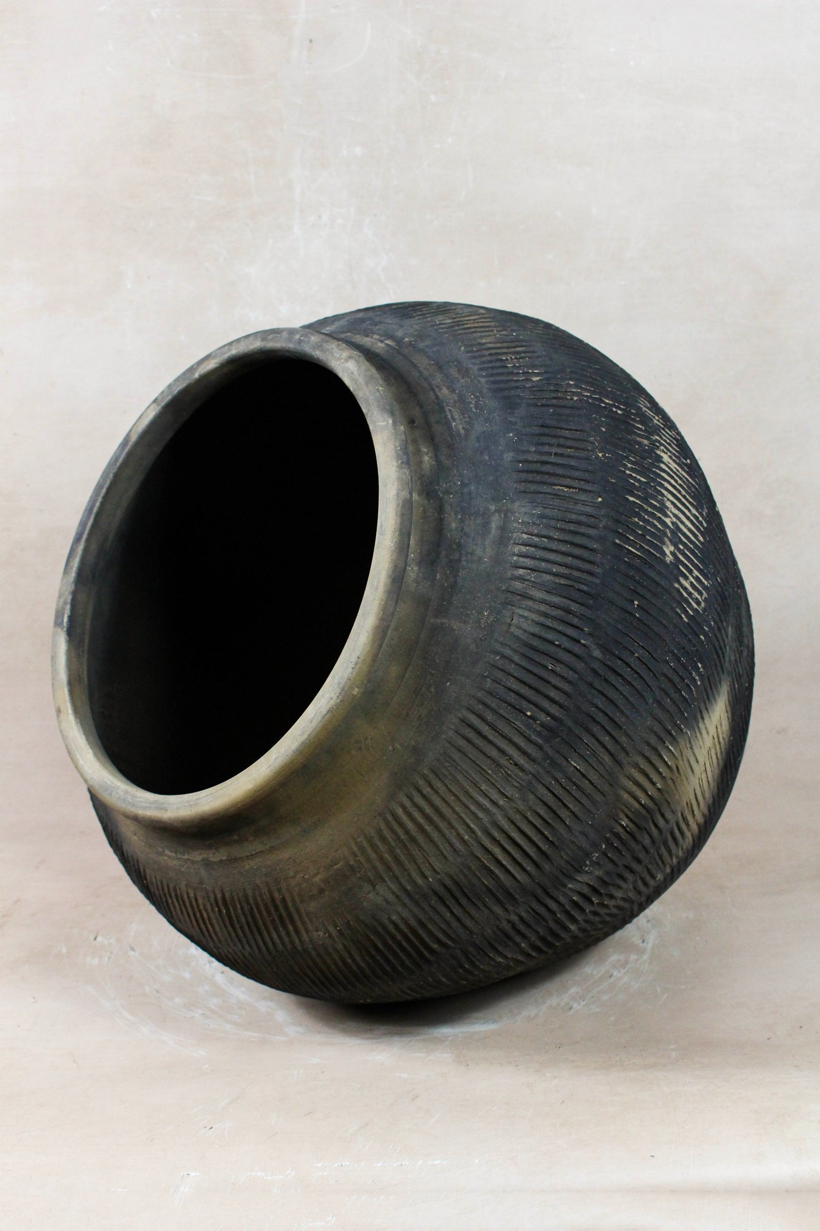 Vintage grey clay pot — opening from above