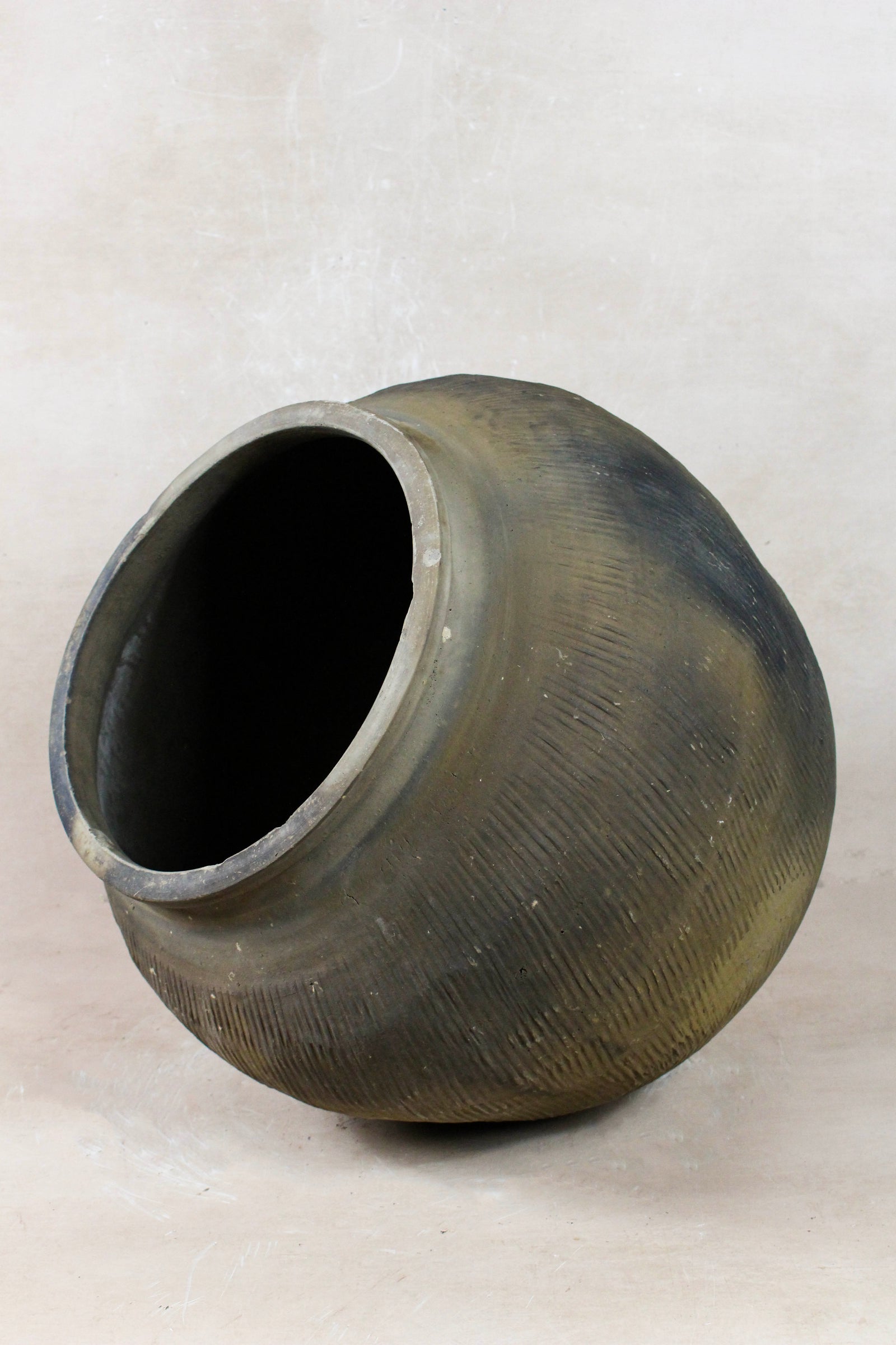 Vintage grey clay pot — opening from above