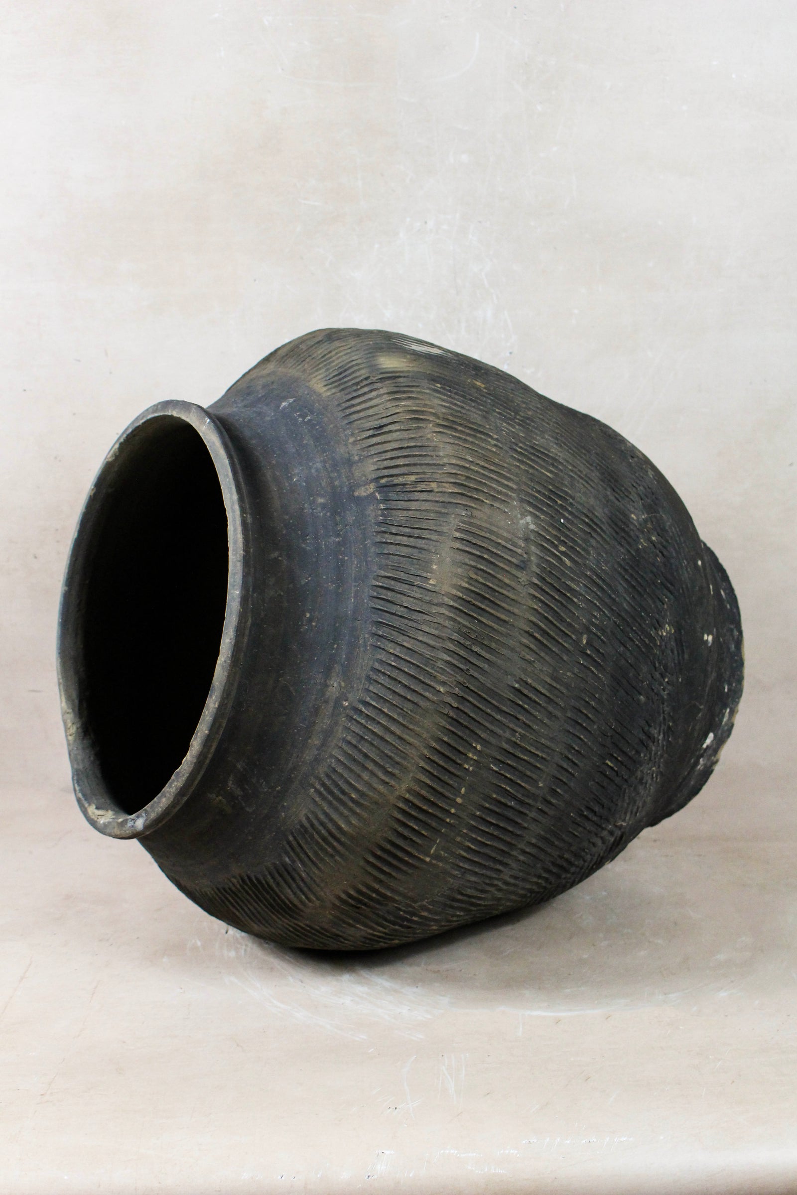 Vintage grey clay pot — opening from above