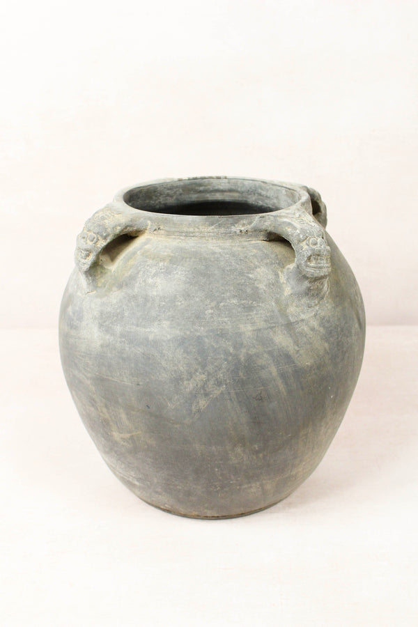 Vintage dark unglazed earthenware pot with lion-ear handles from Shanxi, China