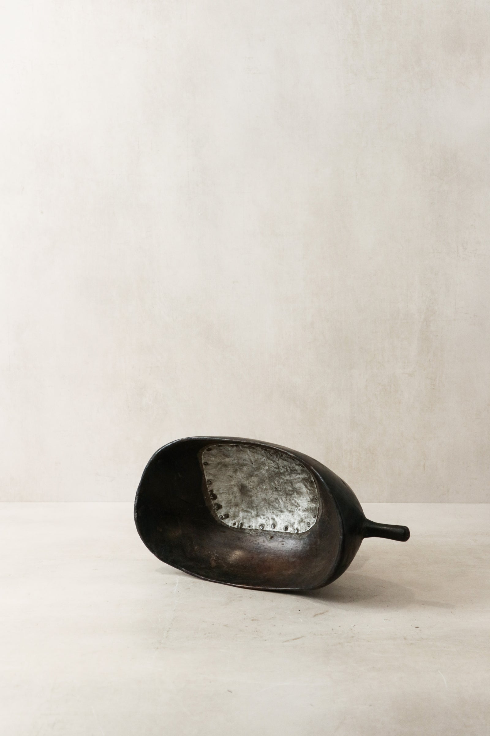 Vintage hand-carved Tutsi bowl from Rwanda with tin repairs