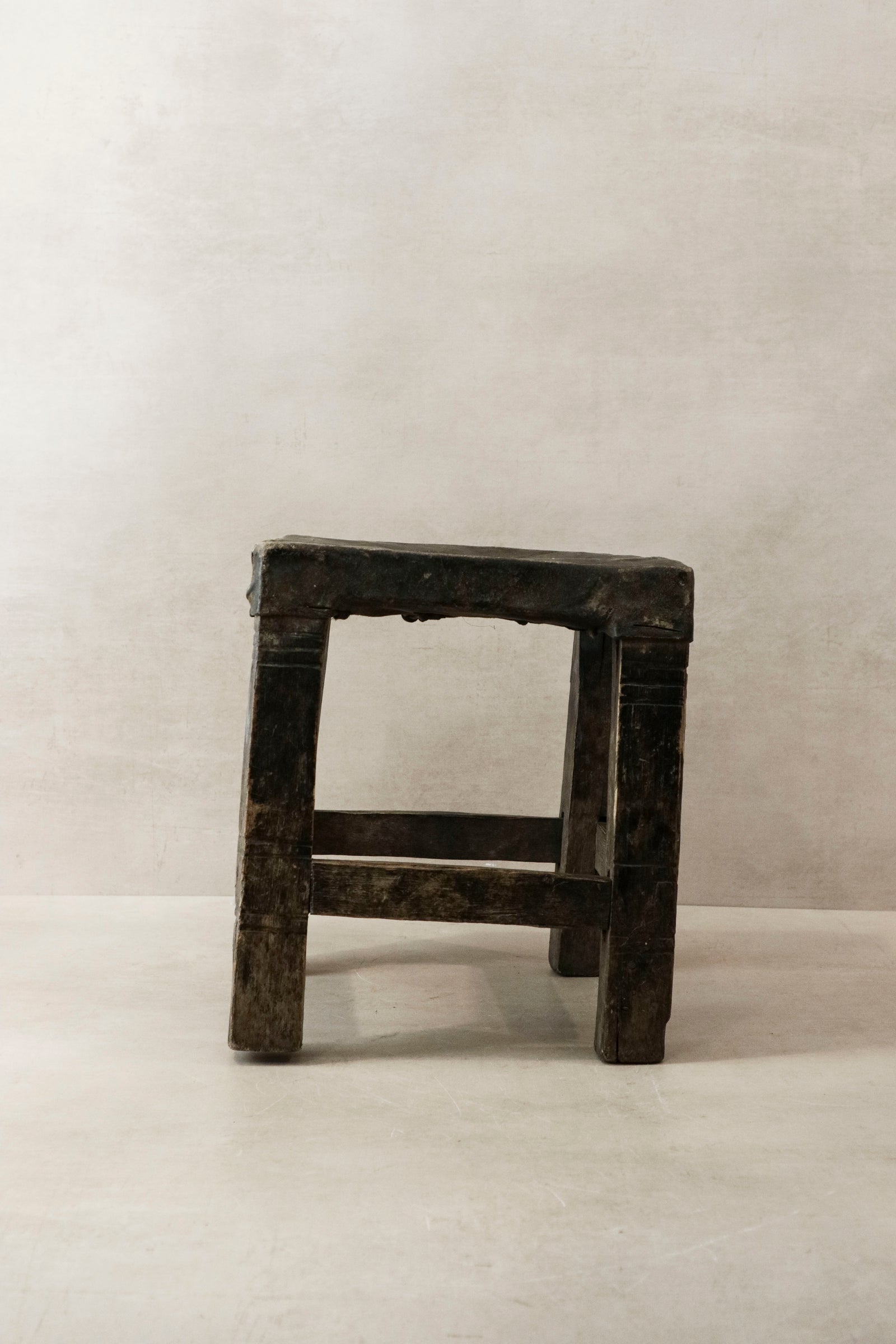 Chokwe stool — detail of the tacked hide seat
