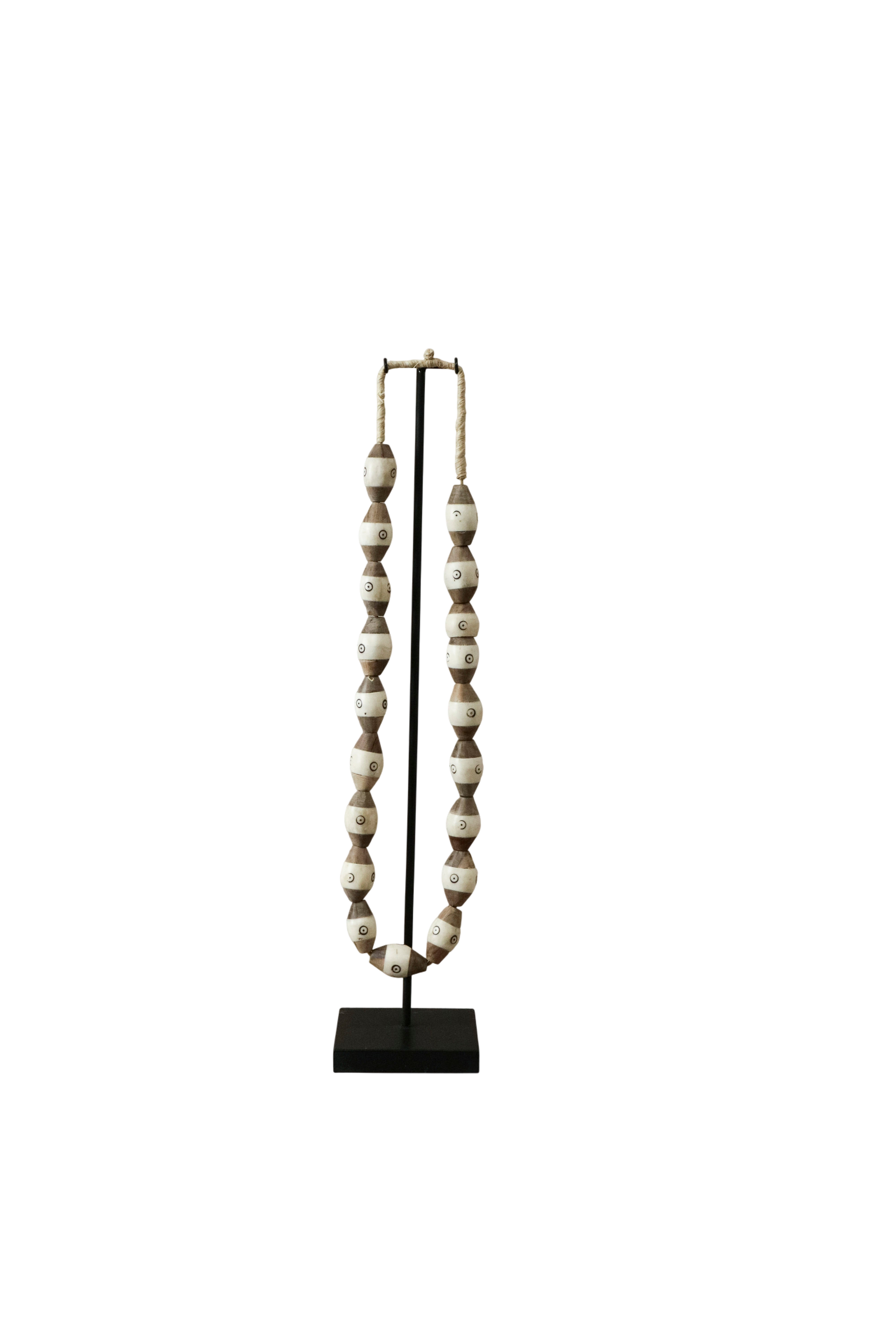 Turkana trade-bead necklace — another view on the stand