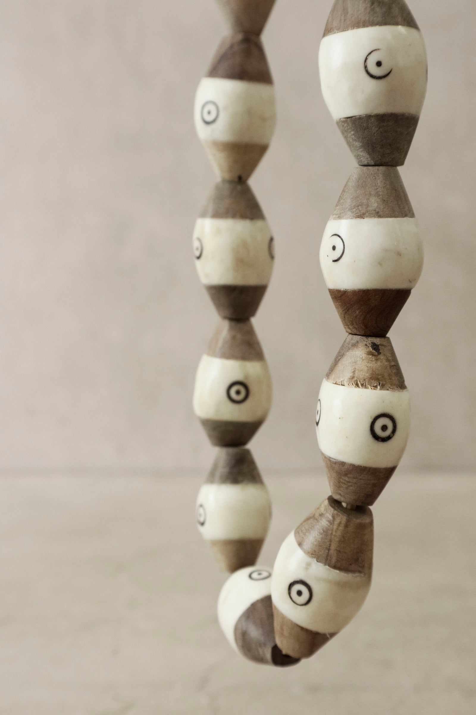Turkana trade-bead necklace — detail of the wood and bone beads