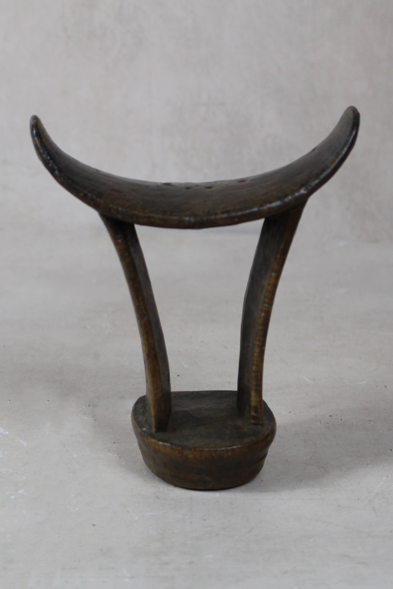 Vintage hand-carved Ethiopian wooden headrest in dark wood, sculptural African artefact (24.4)