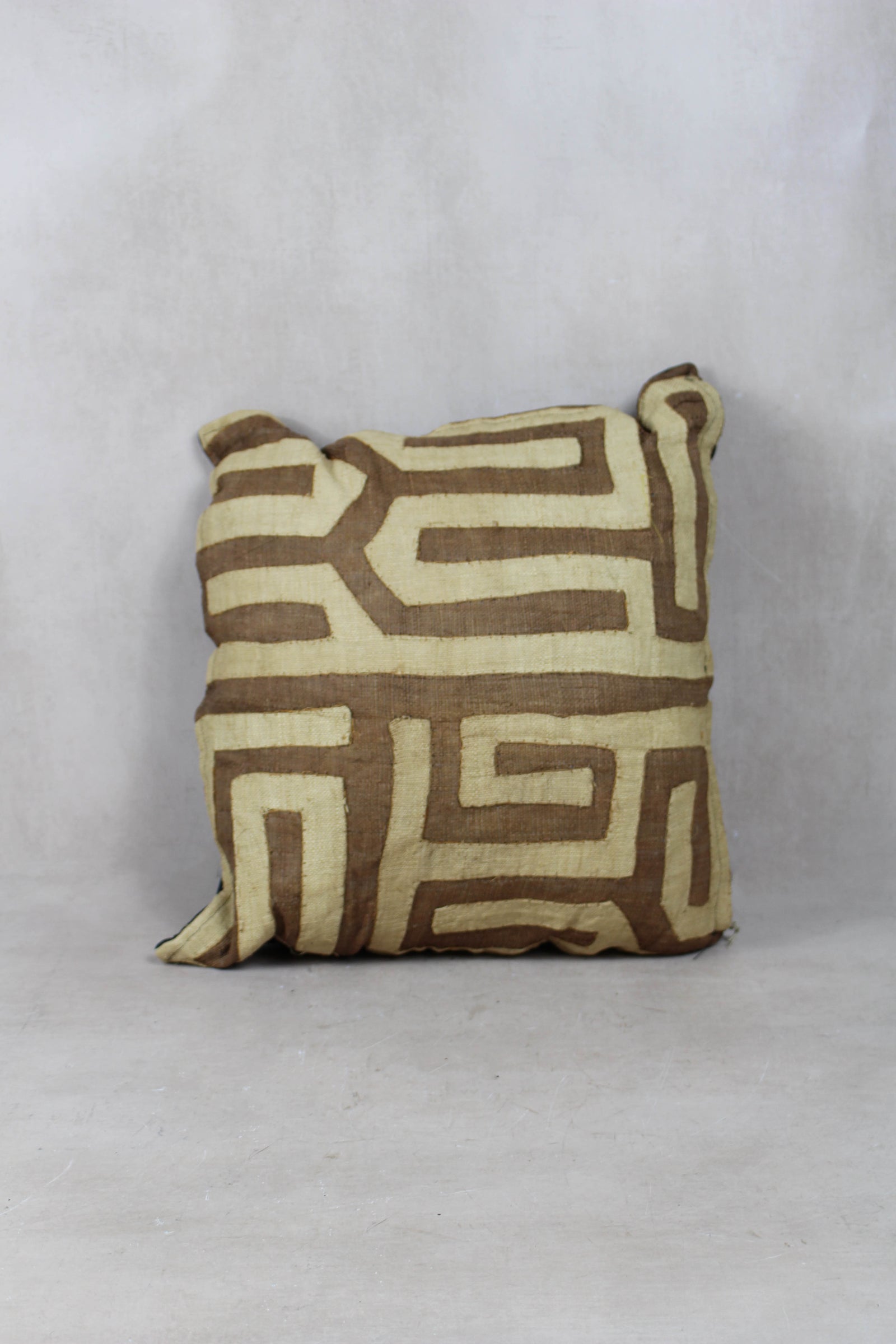 Vintage Kuba cloth cushion — geometric raffia detail