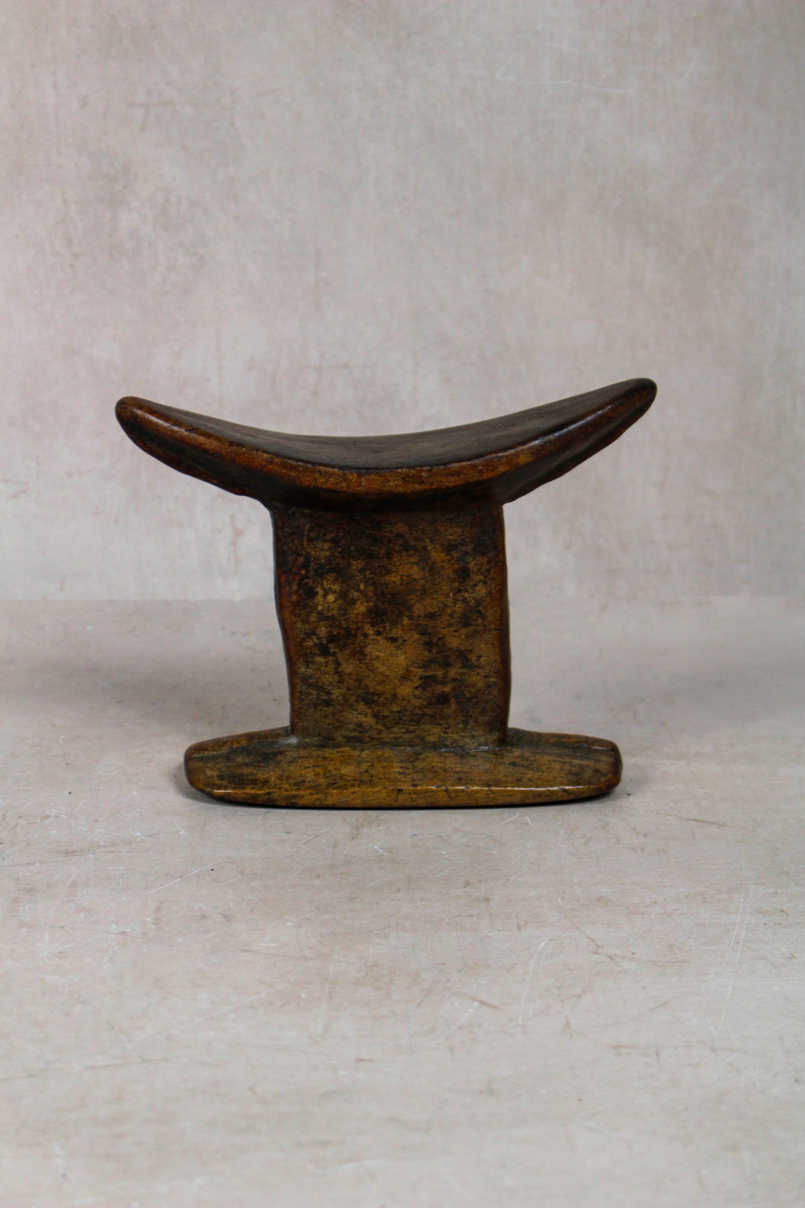 Vintage hand-carved Ethiopian wooden headrest in dark wood, sculptural African artefact (23.10)