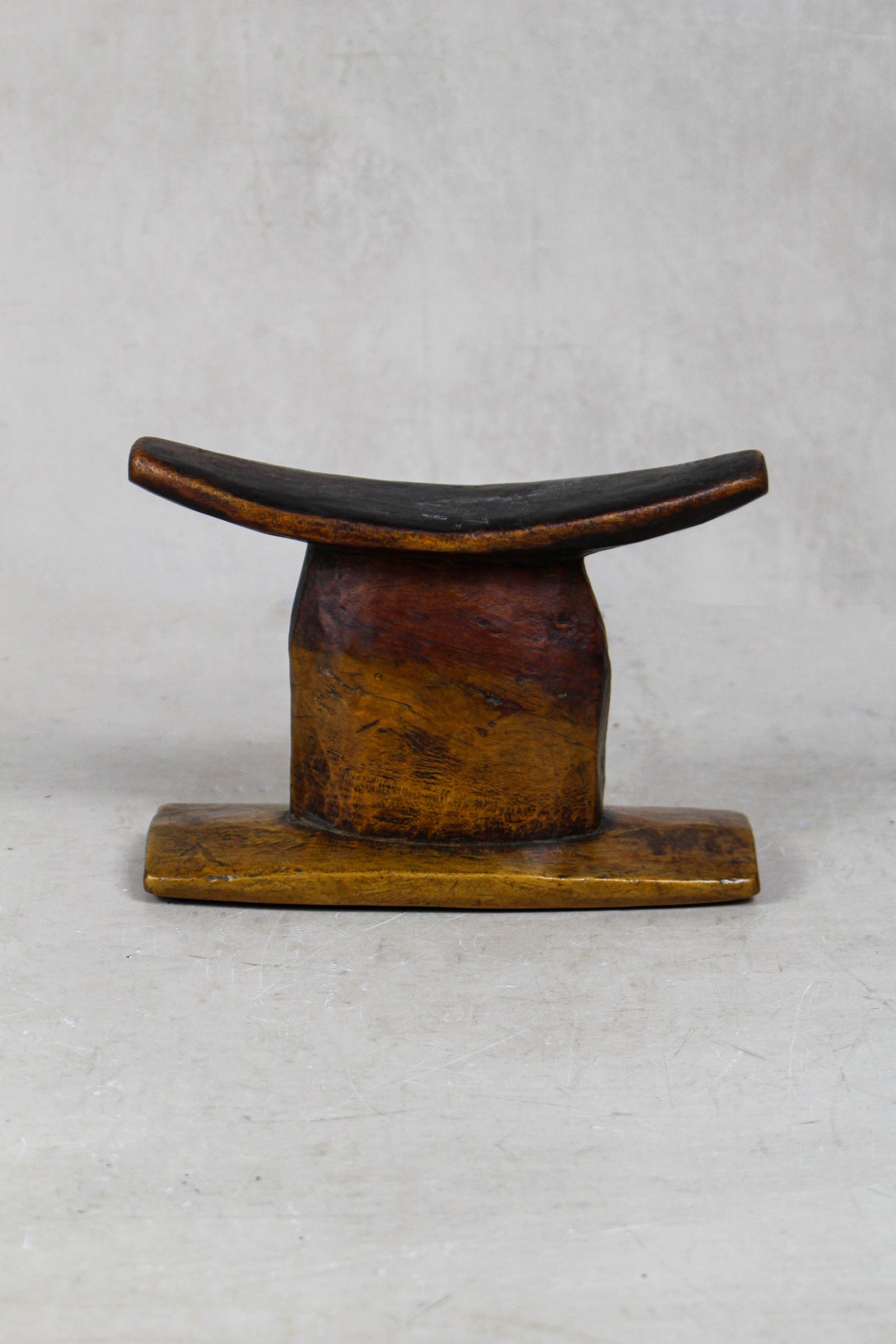 Vintage hand-carved Ethiopian wooden headrest in dark wood, sculptural African artefact (23.11)