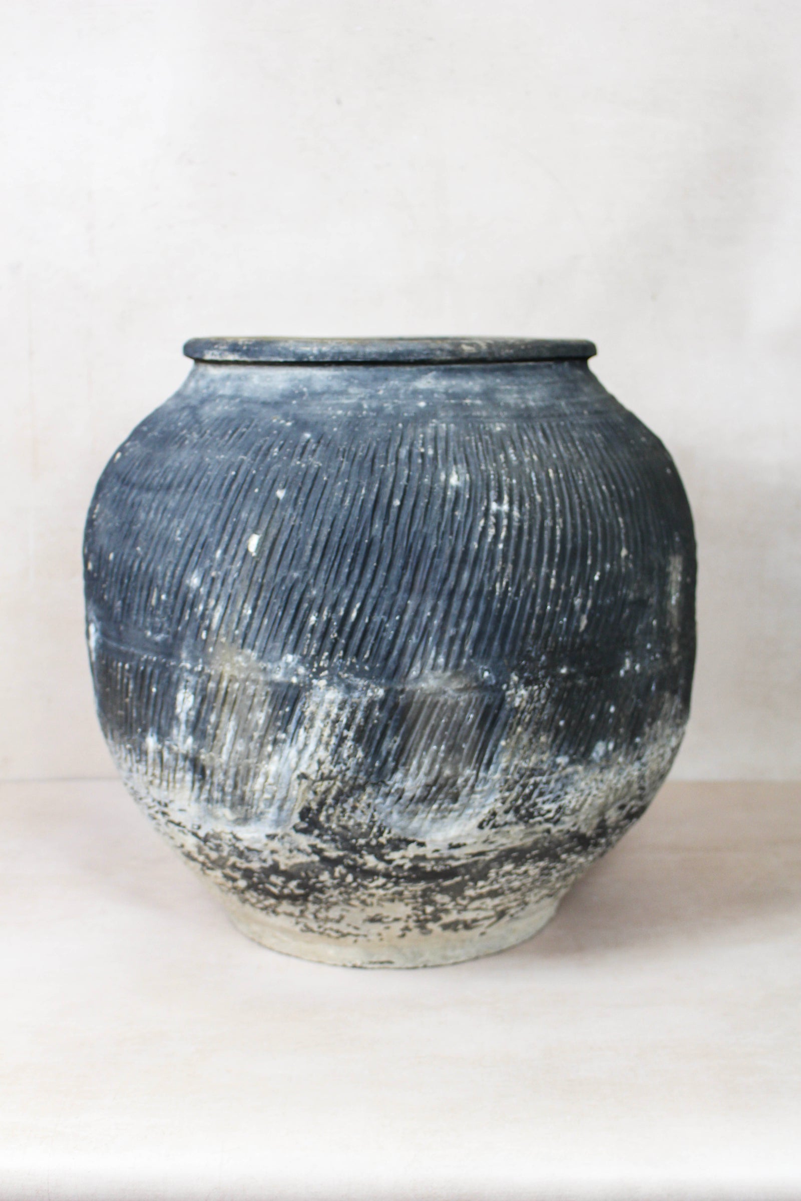 Vintage grey clay pot — opening from above
