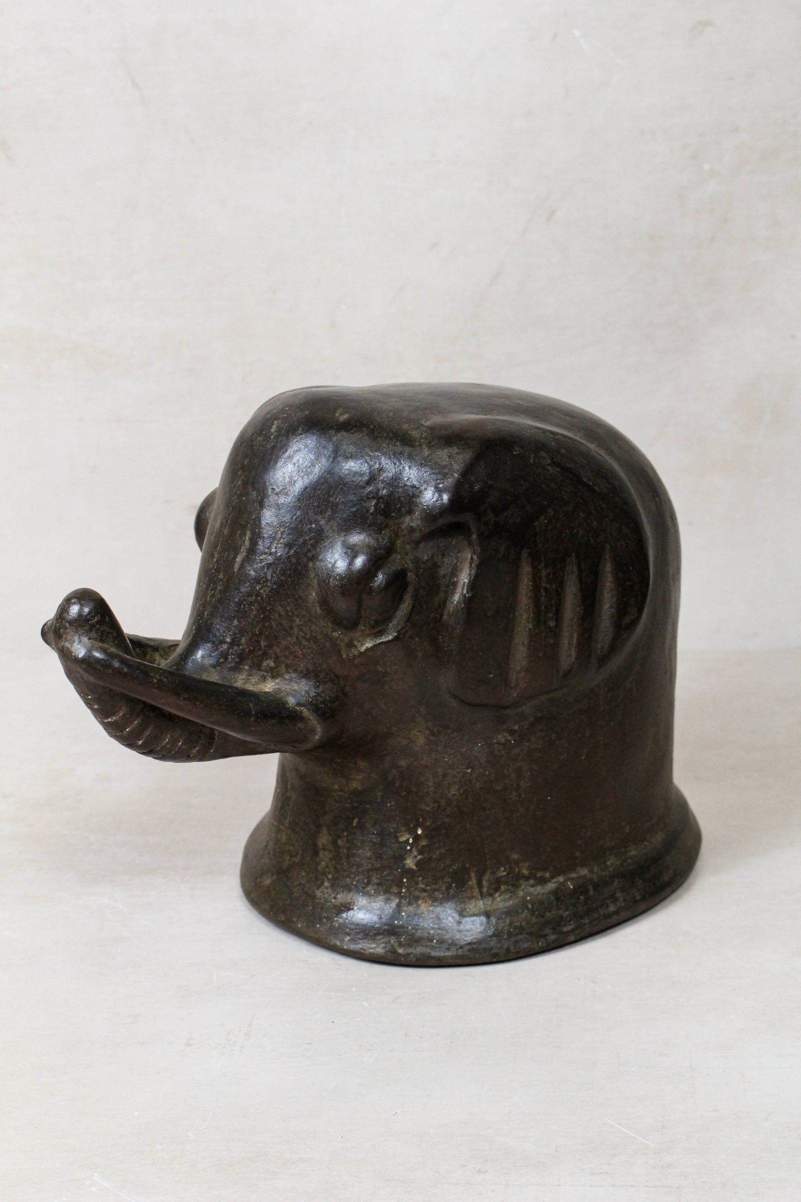 Mangbetu terracotta elephant head sculpture — side view