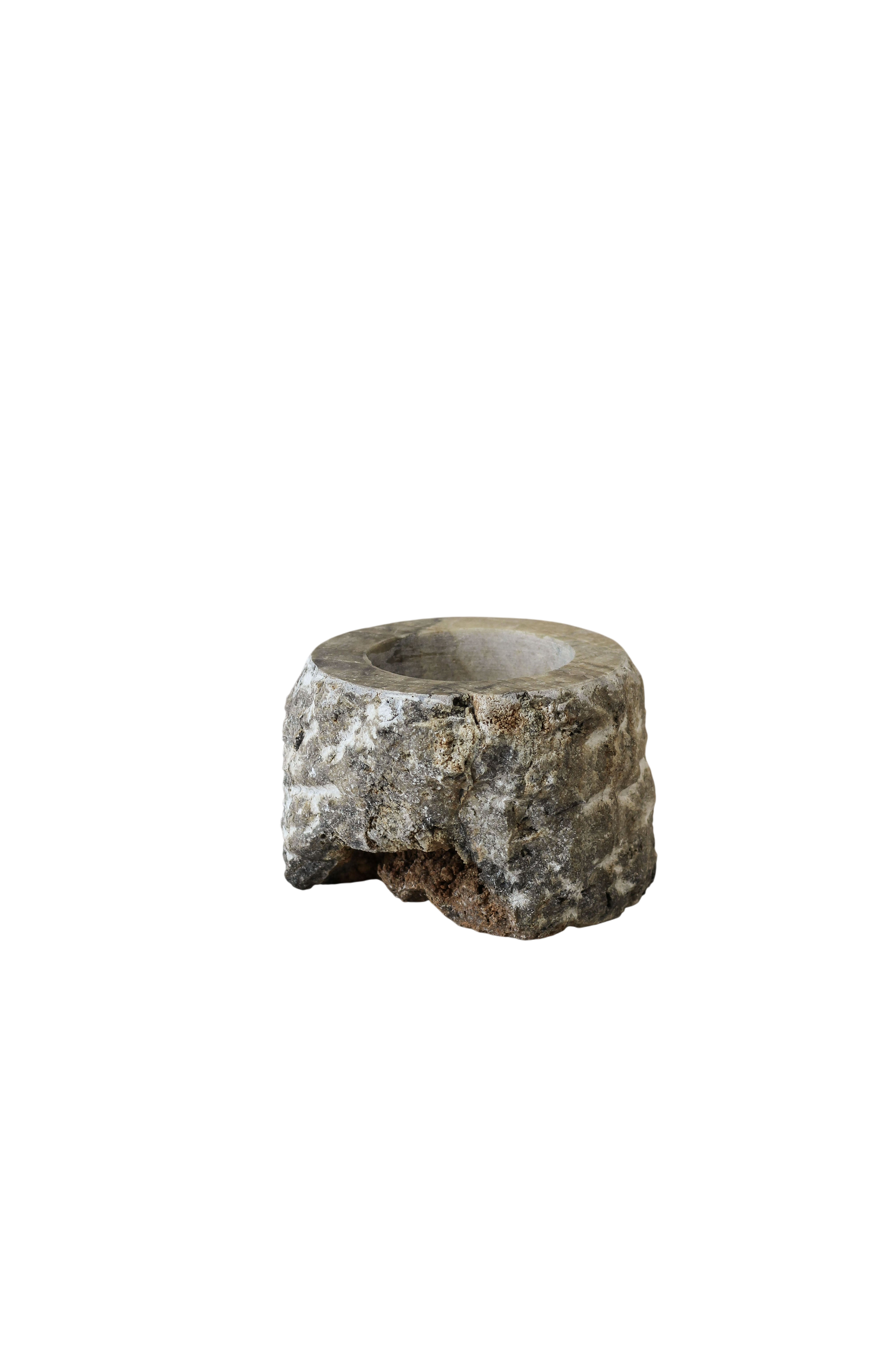 Rough-cut onyx candle holder with polished top and raw natural sides