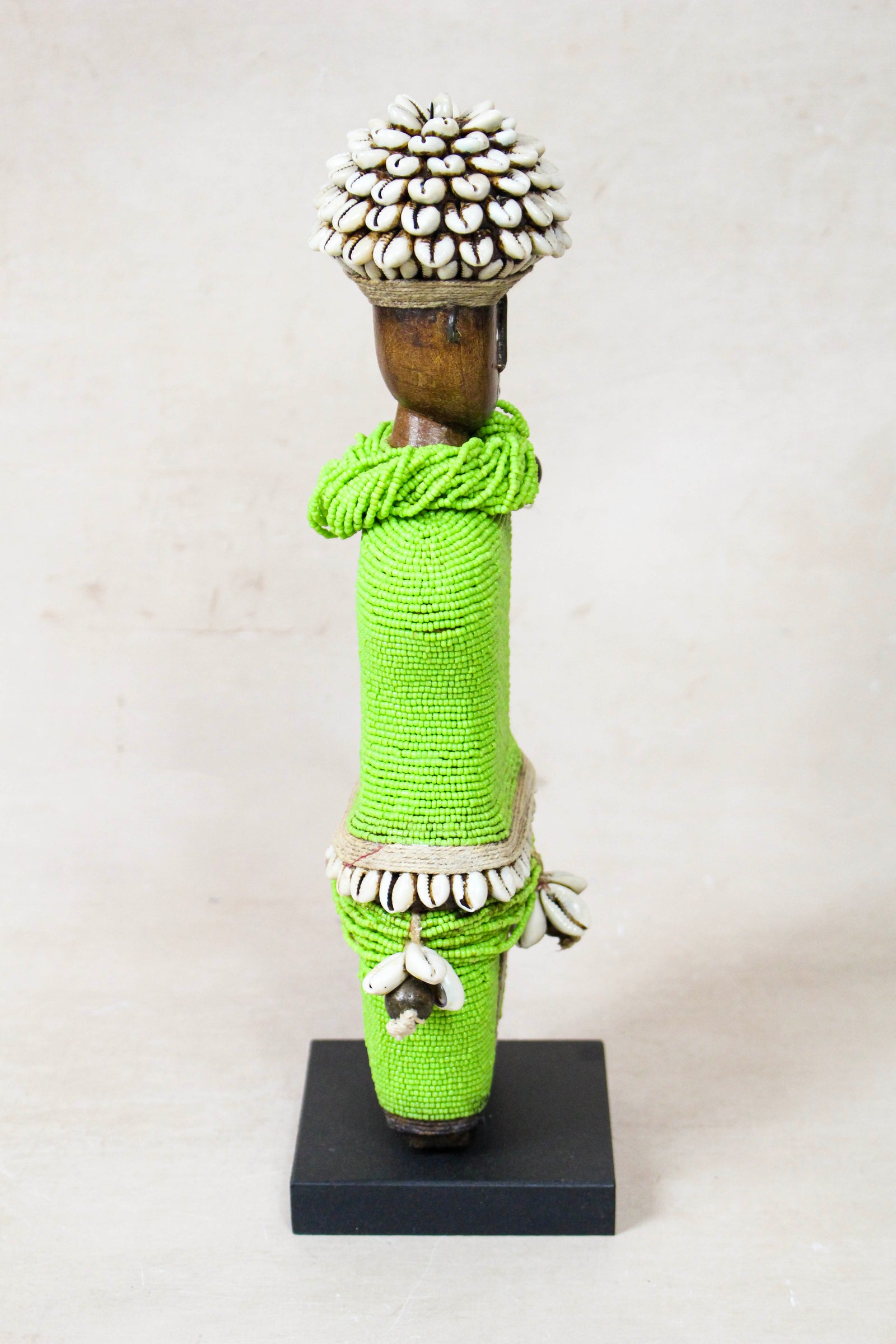 Green Namji beaded doll — side view