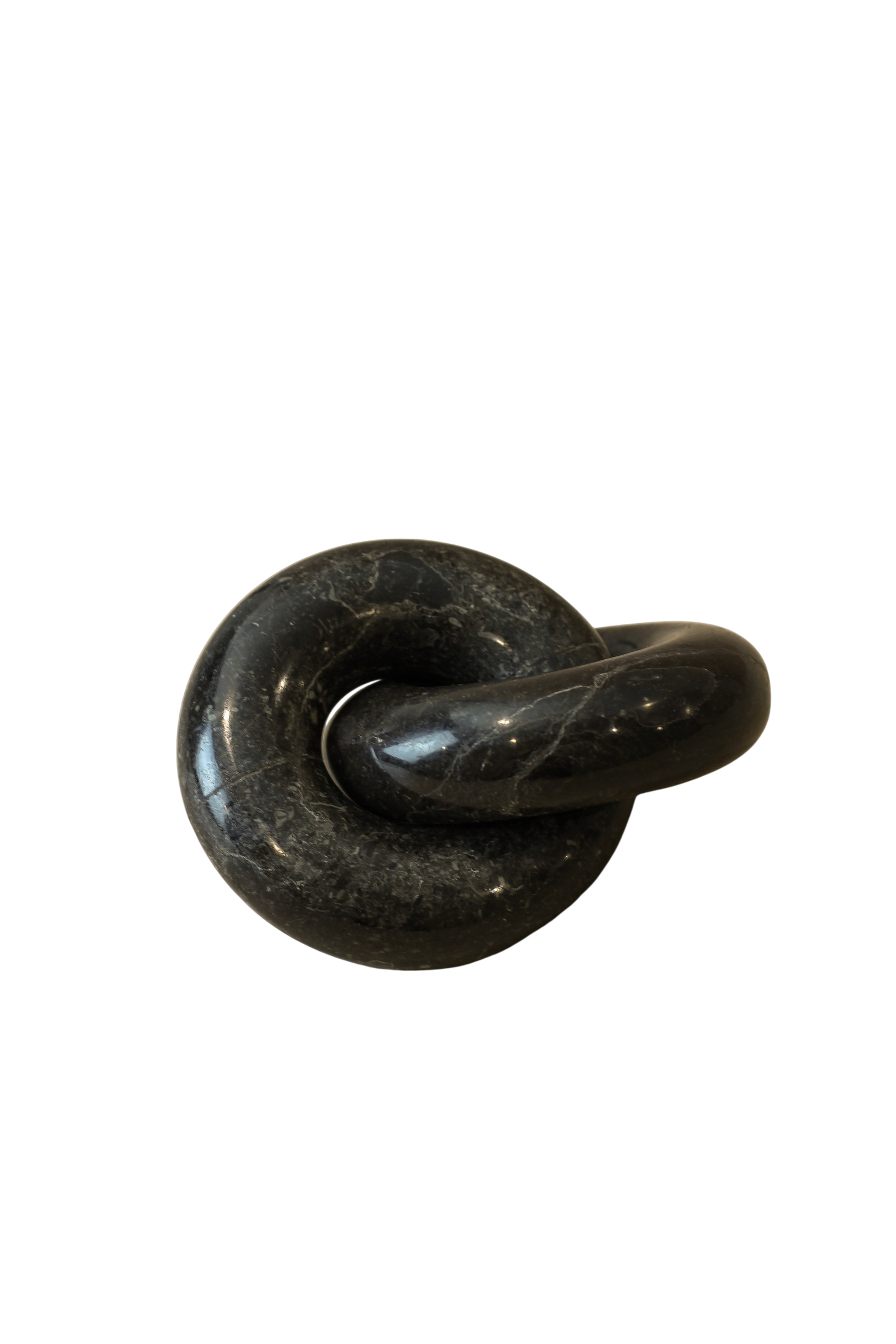 Solid black marble decorative chain-link ornament with natural veining