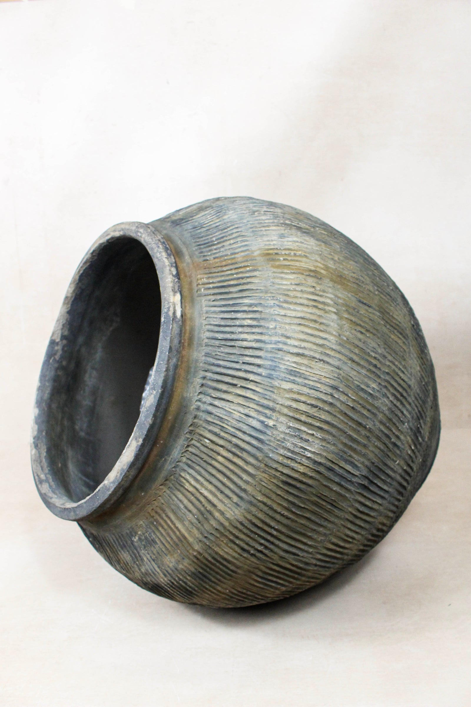 Vintage grey clay pot — opening from above