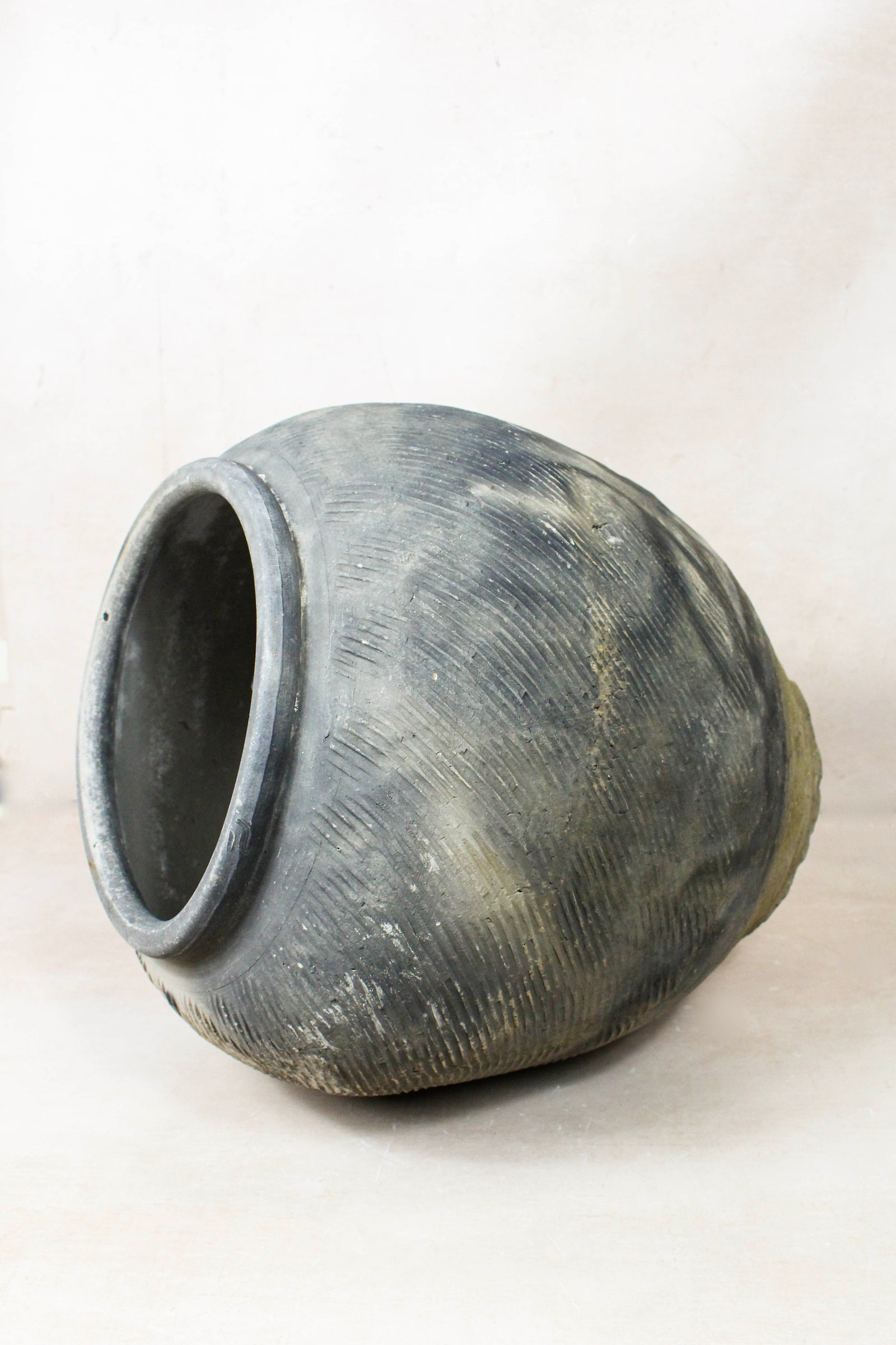 Vintage grey clay pot — opening from above