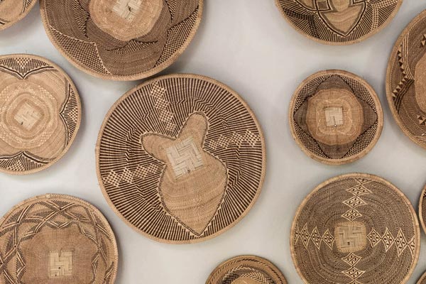 Handwoven Tonga winnowing basket from Zimbabwe in natural Ilala palm
