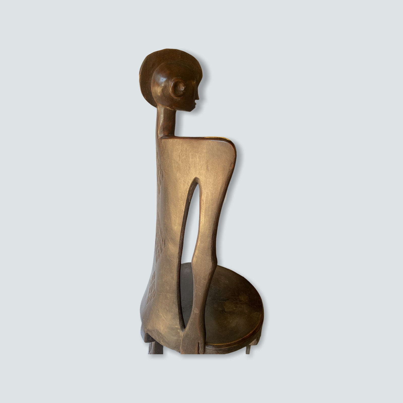 Makonde carved wooden chair, Tanzania — side view