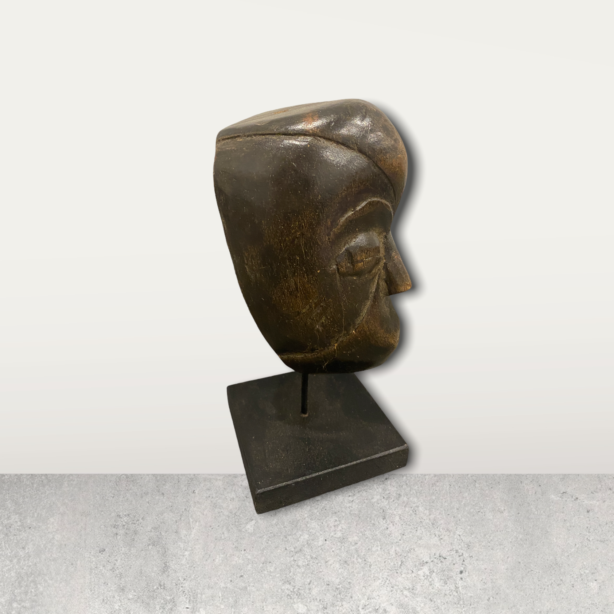 Small African mask on stand