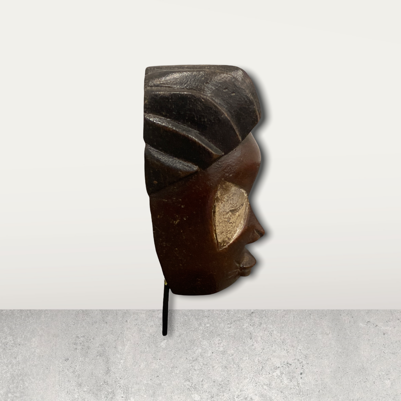 Small African mask on stand