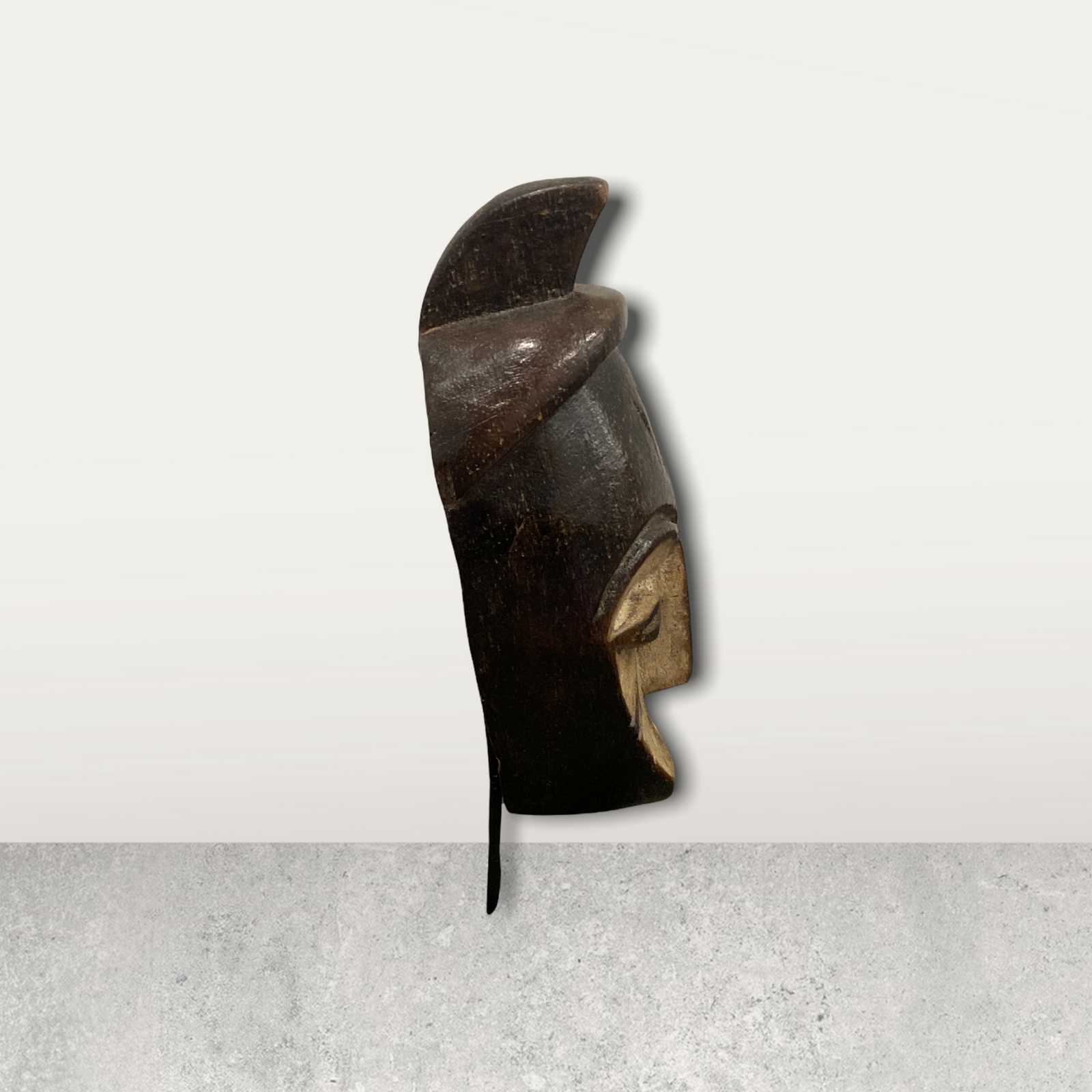 Small African mask on stands
