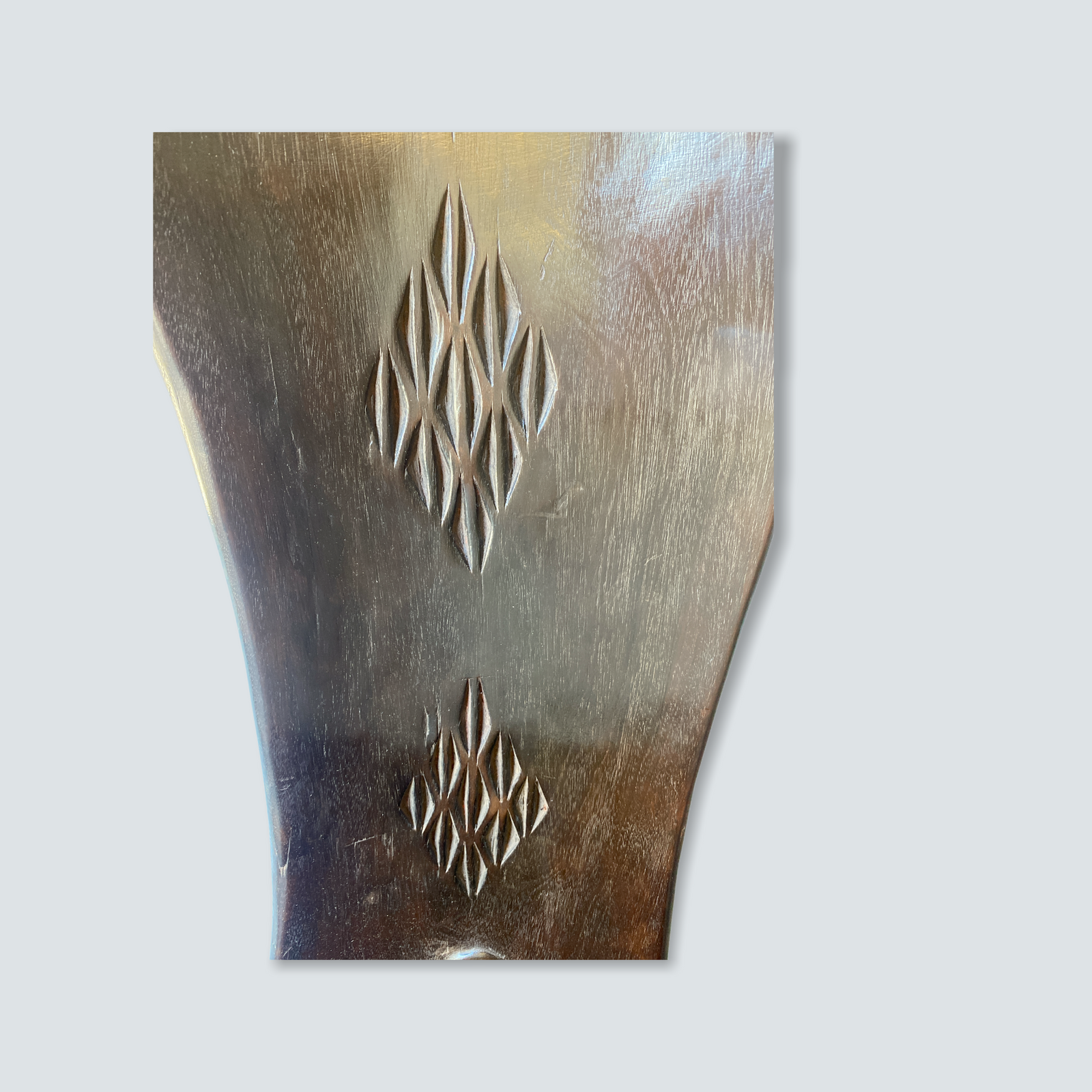Makonde carved wooden chair, Tanzania — angled view