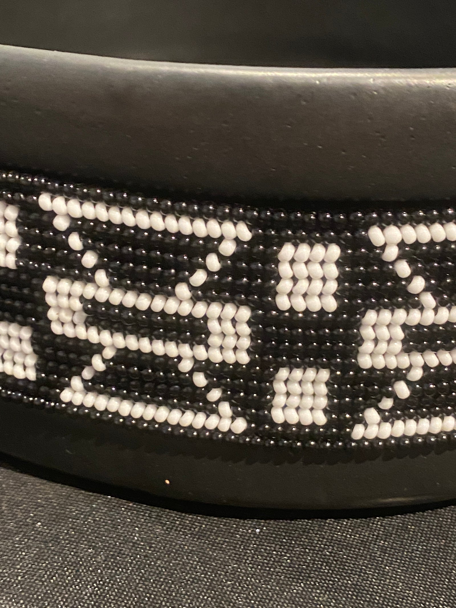 Contemporary ceramic bowl with a handmade glass beaded band around the rim