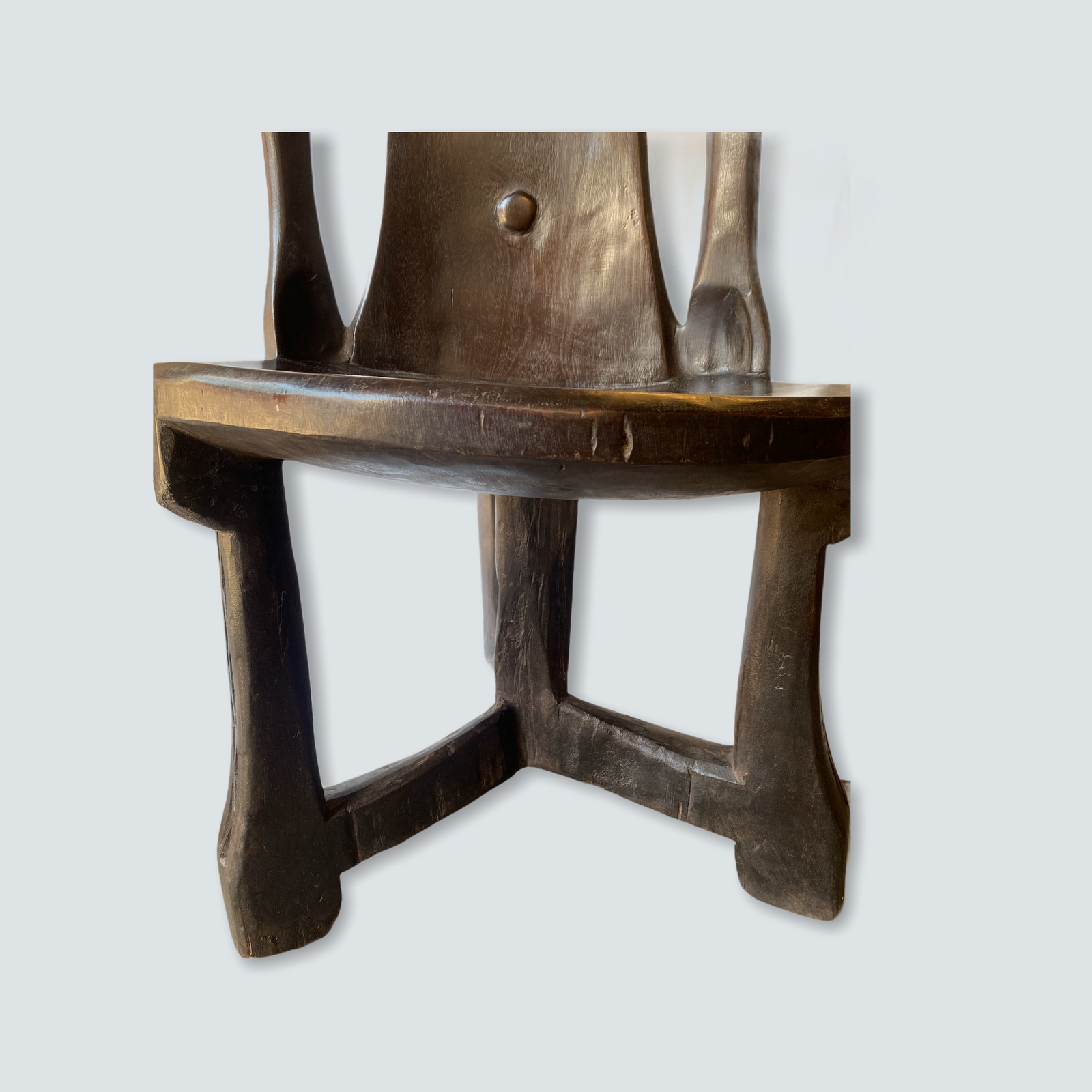 Detail of the ancestor head carved at the top of the Makonde chair