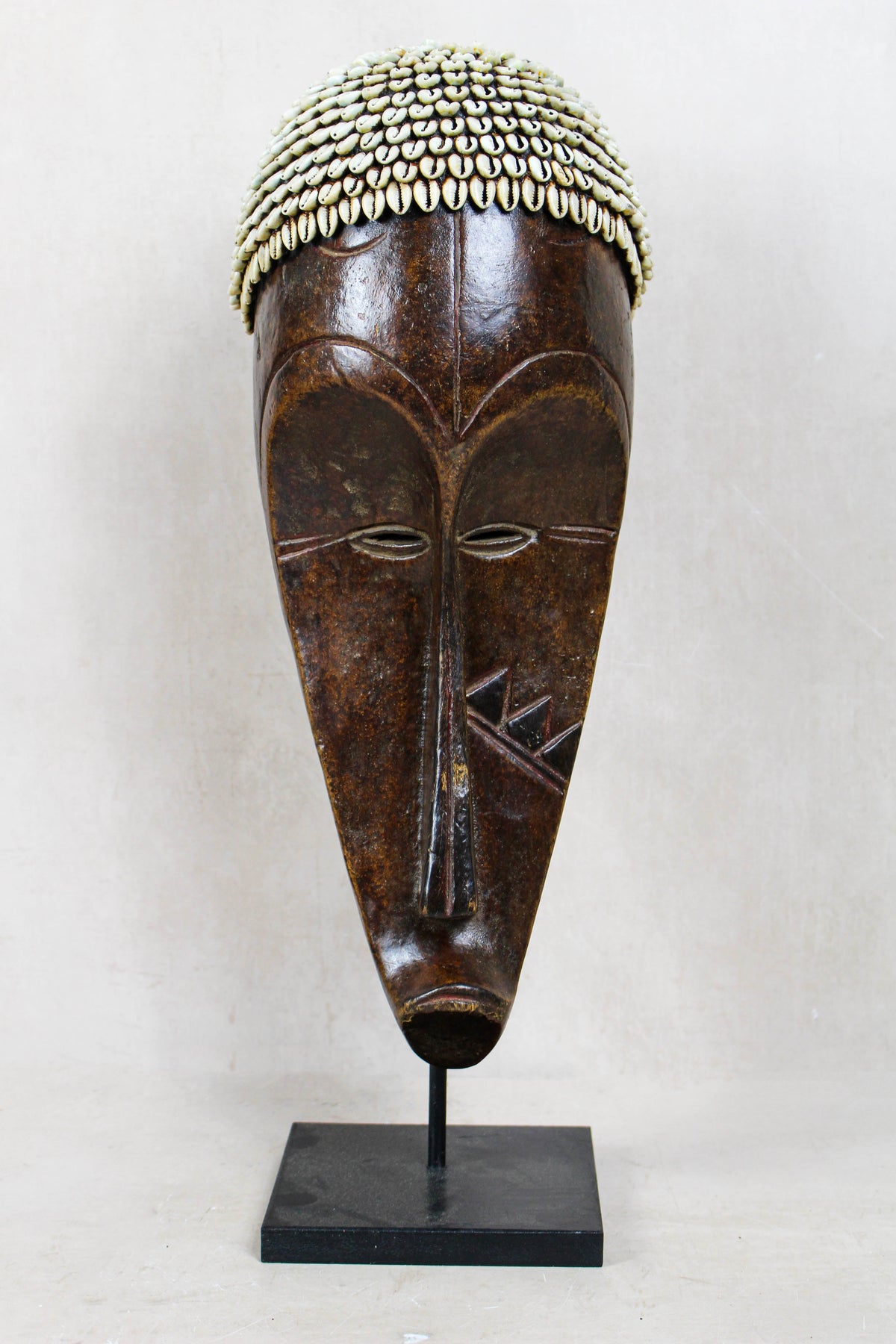 Hand-carved Fang Ngil mask from Gabon