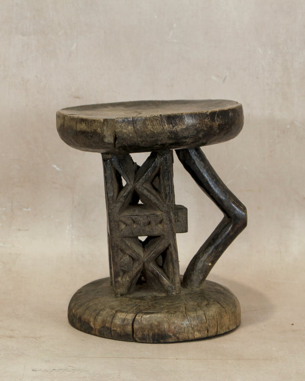 Hand-carved Tonga stool from Zimbabwe in natural wood