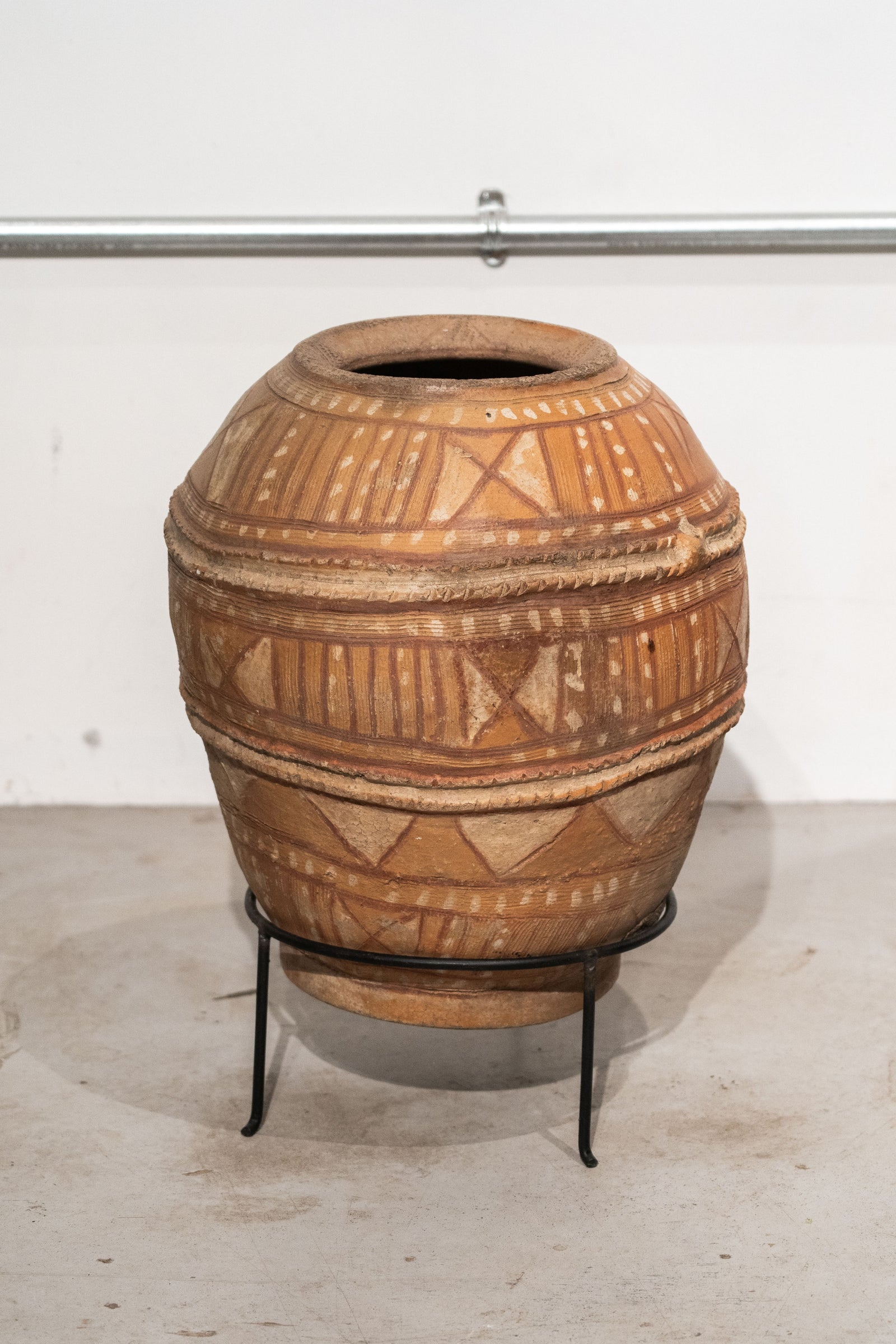 Antique Nupe water pot from Nigeria with incised geometric patterns