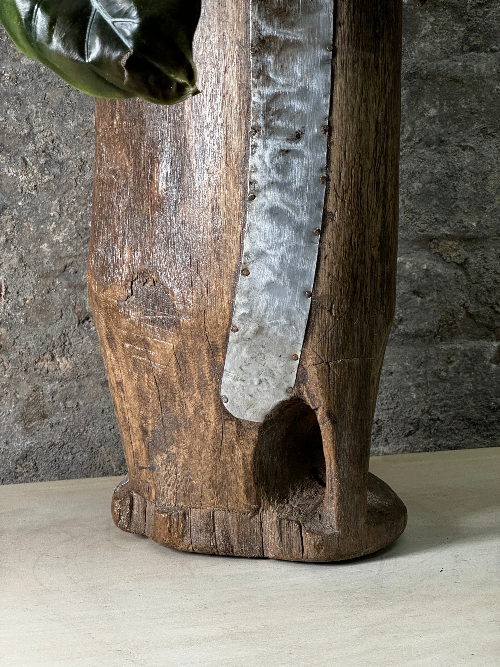 Vintage Tutsi Grain Stomper planted with Philodendron Red Shield FR20