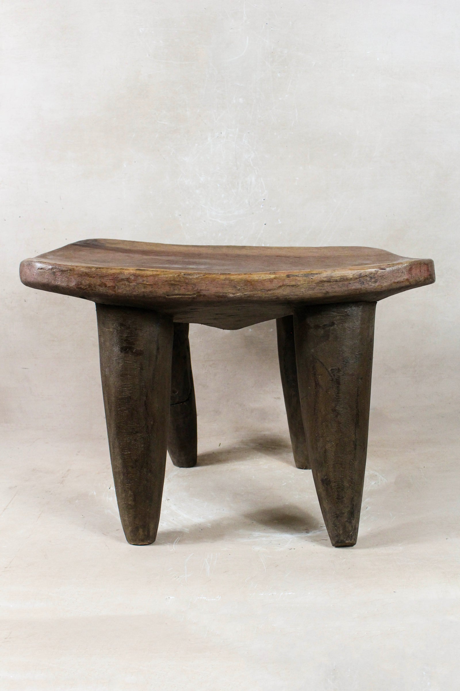 Large sculptural hand-carved Senufo stool in solid wood