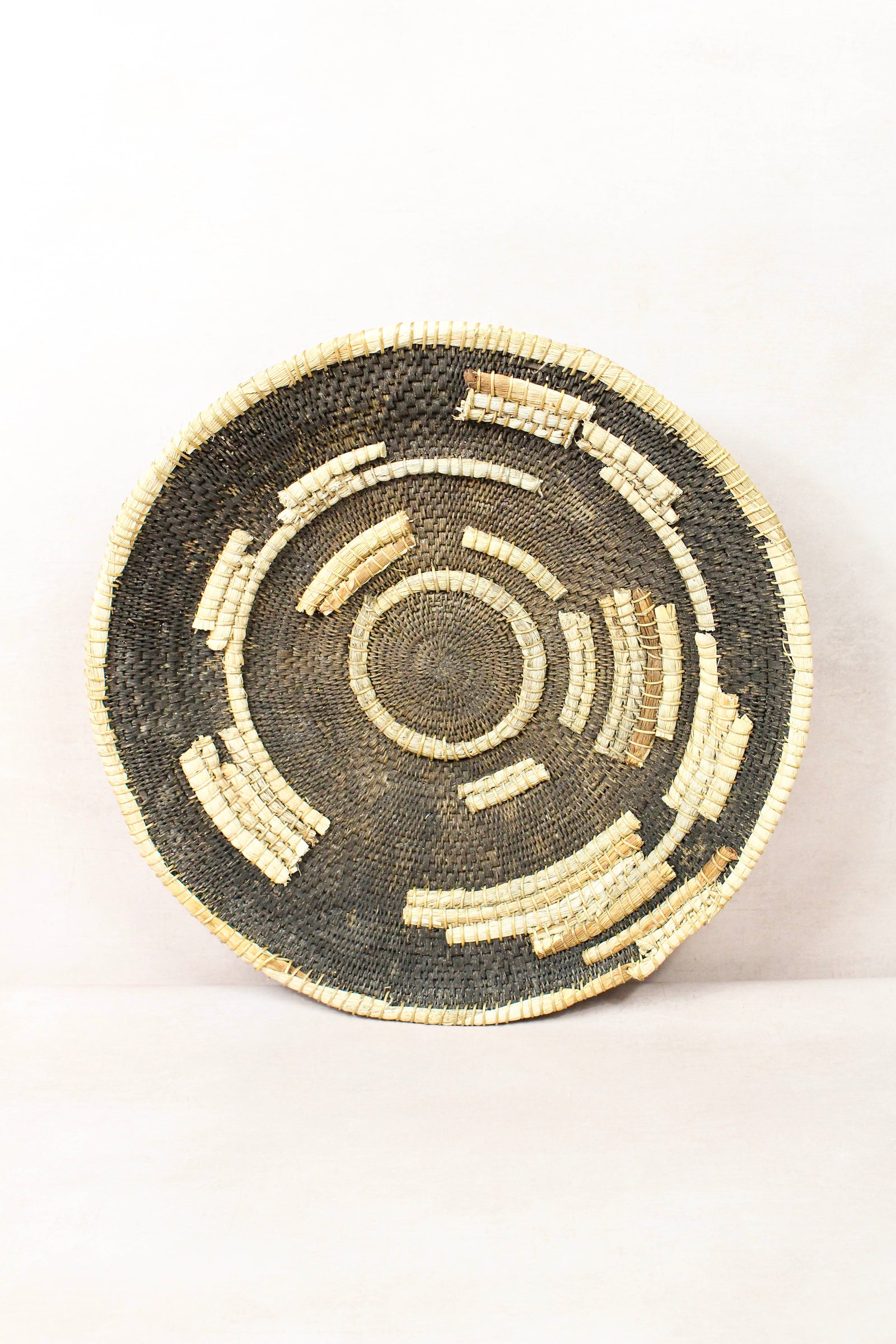 Vintage handwoven Makenge basket from Zambia made from natural tree roots