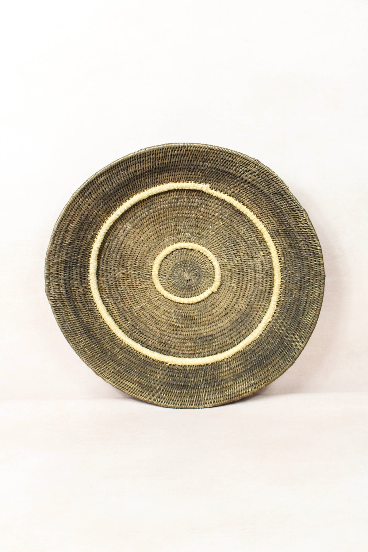 Vintage handwoven Makenge basket from Zambia made from natural tree roots