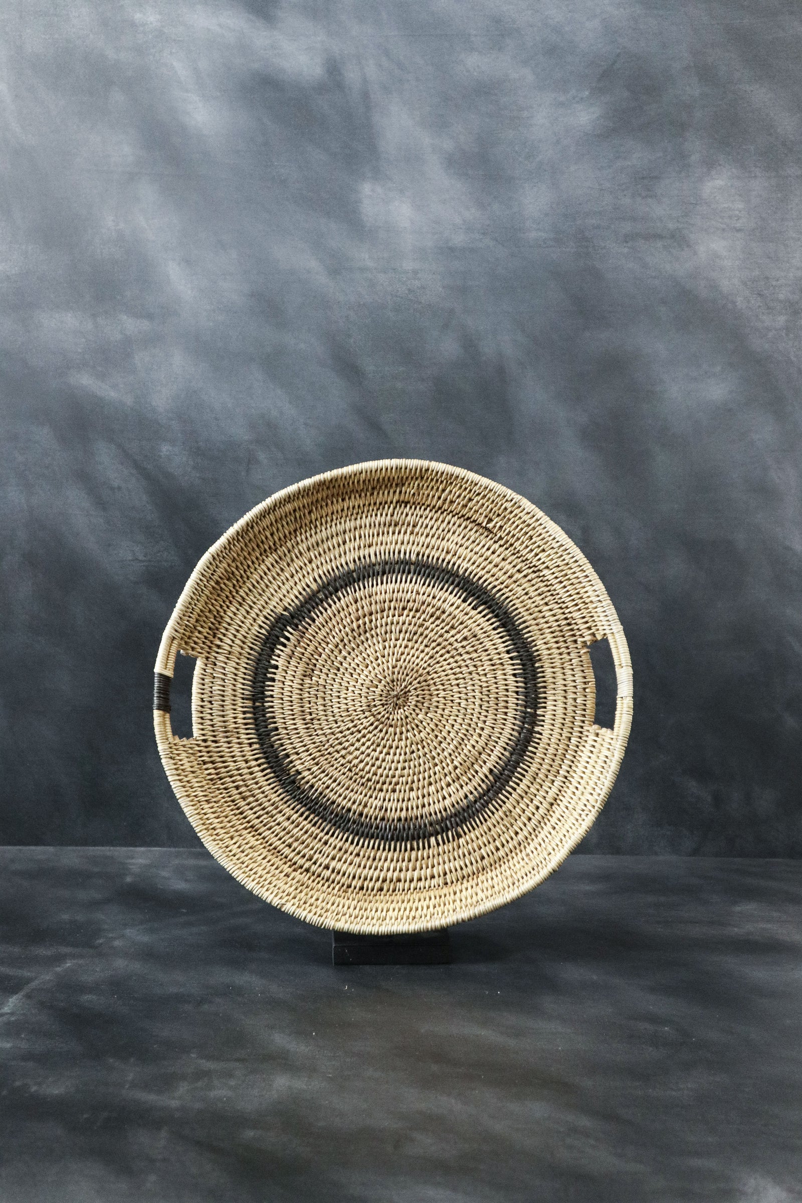 Handwoven Makenge winnowing tray from Zambia made from natural tree roots