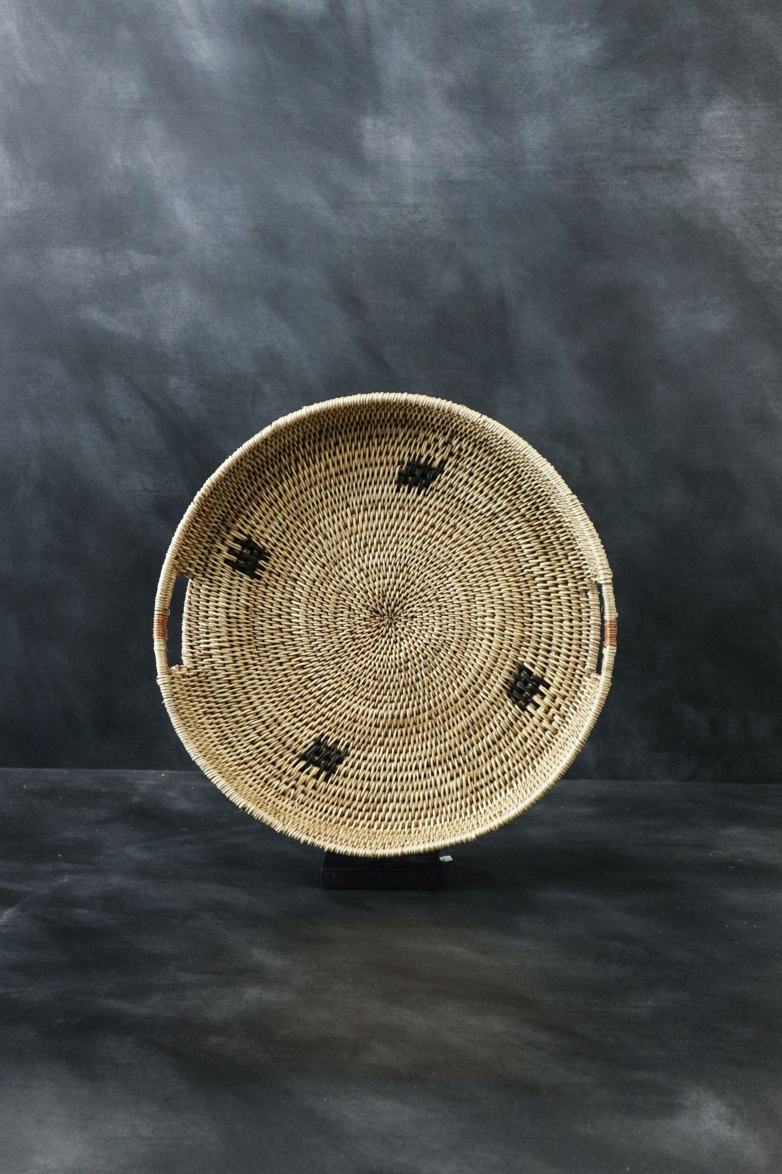 Handwoven Makenge winnowing tray from Zambia made from natural tree roots