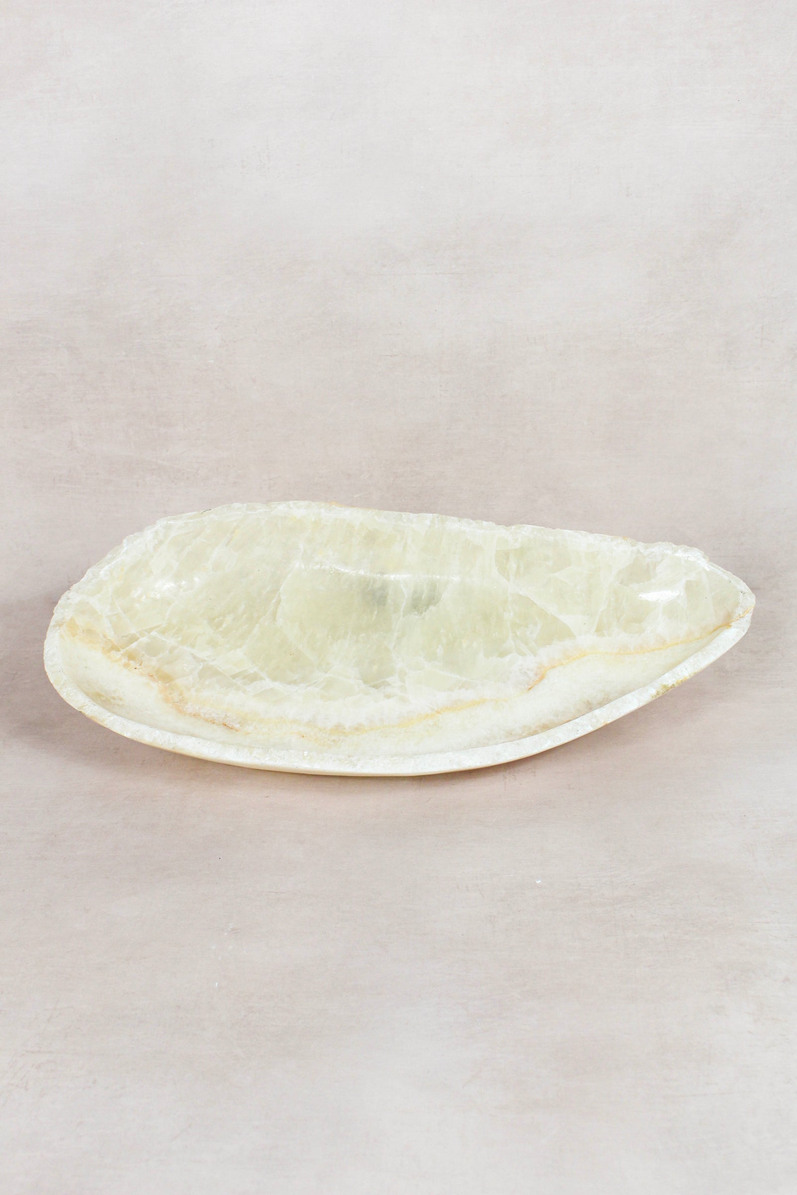 Raw-edge onyx bowl hand-carved from natural stone