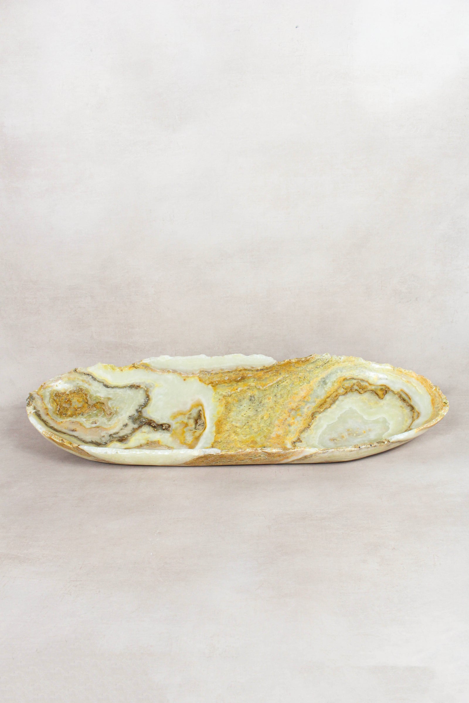 Raw-edge onyx bowl hand-carved from natural stone