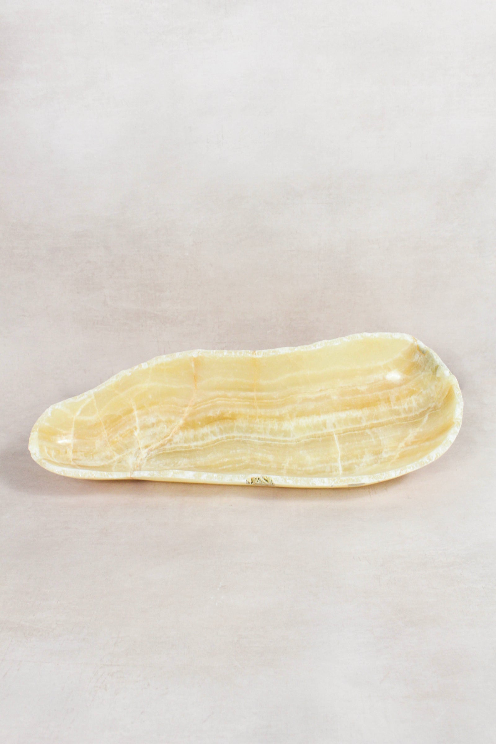 Raw-edge onyx bowl hand-carved from natural stone