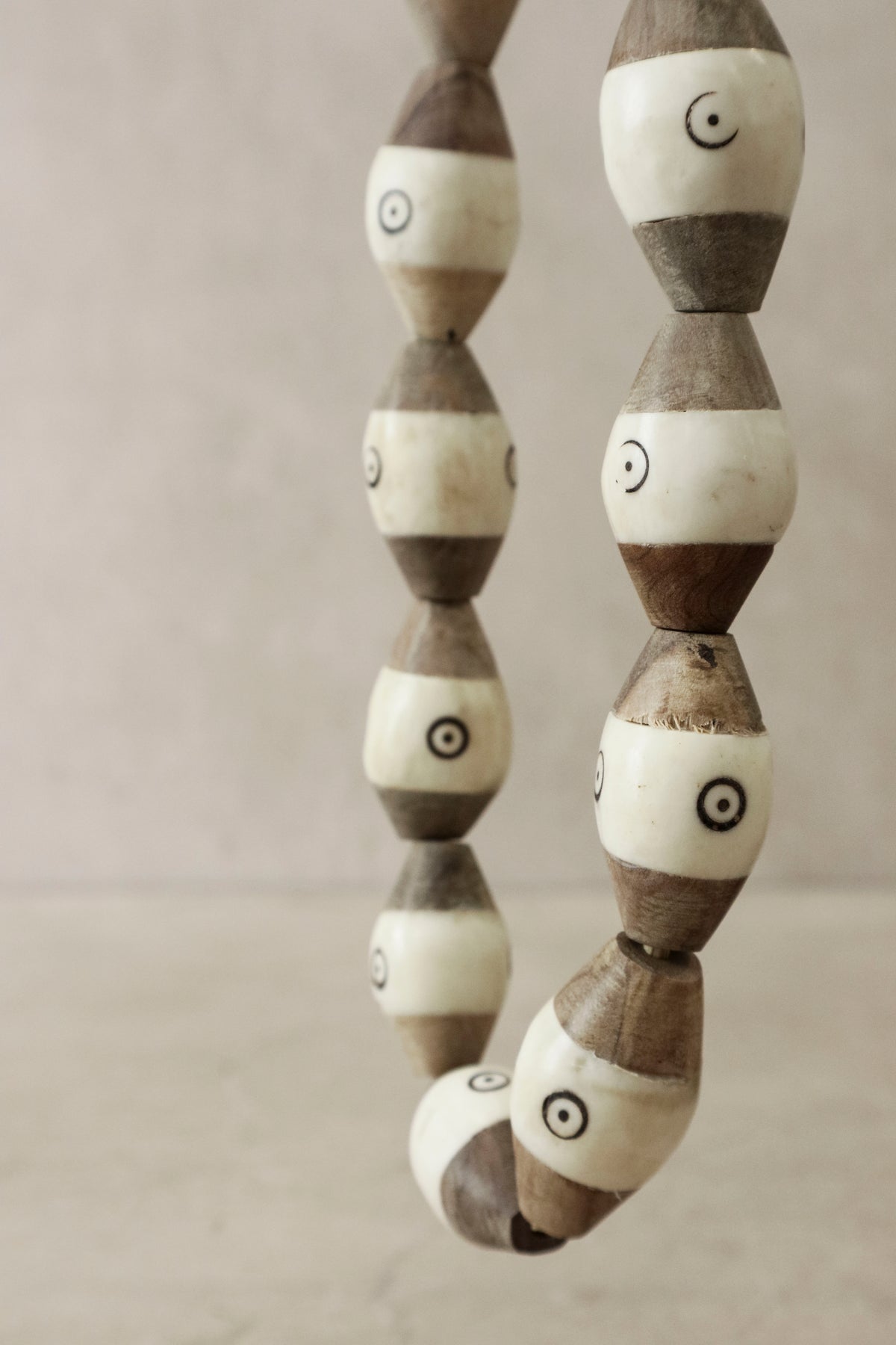 Turkana trade-bead necklace — detail of the wood and bone beads