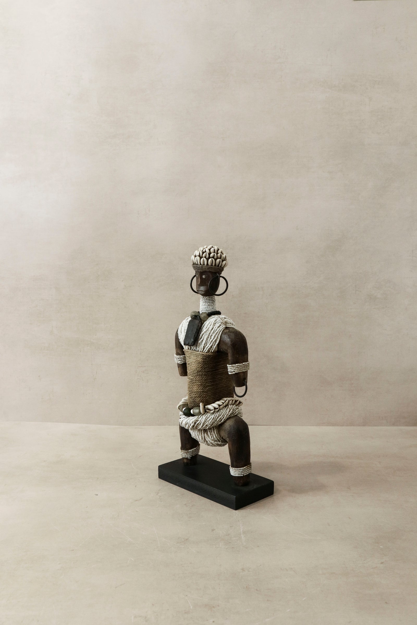 White Namji beaded doll — side view