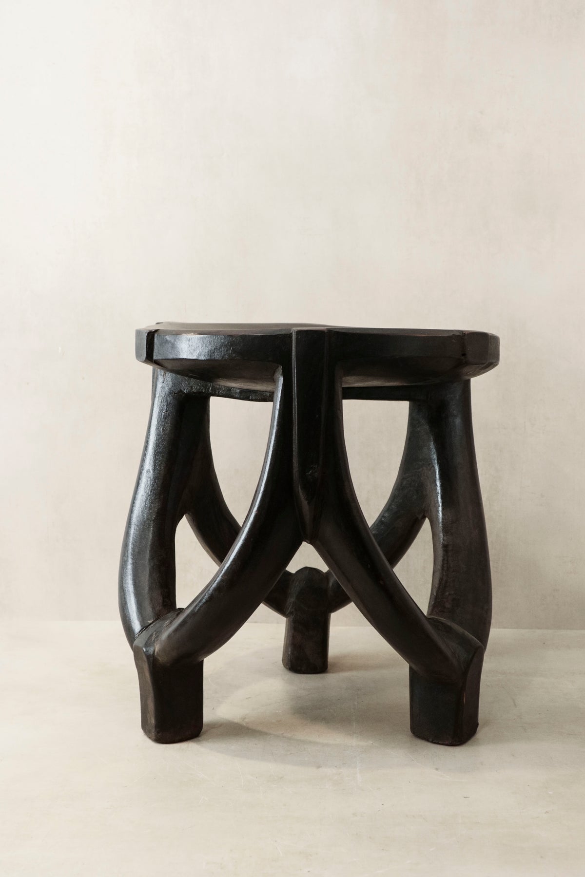 Makonde carved wooden stool, Tanzania — side view
