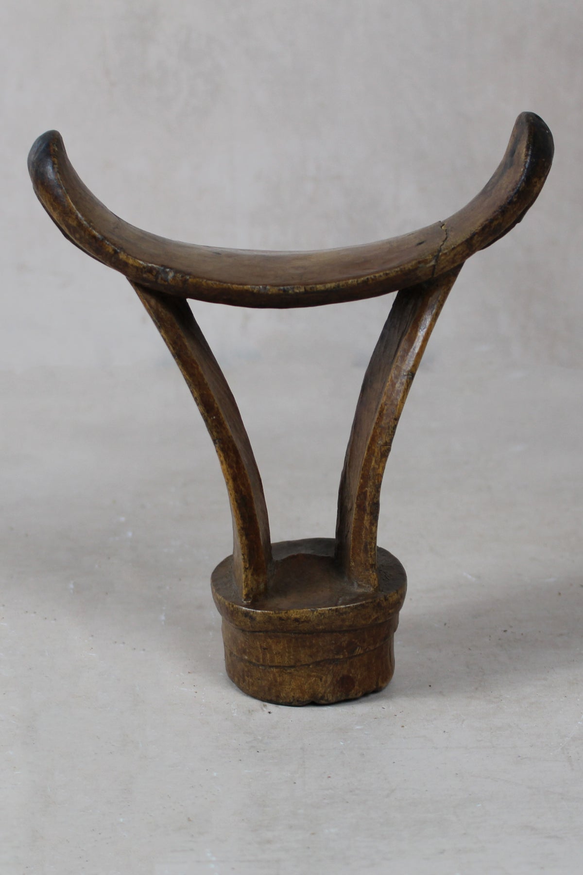 Vintage hand-carved Ethiopian wooden headrest in dark wood, sculptural African artefact (24.3)