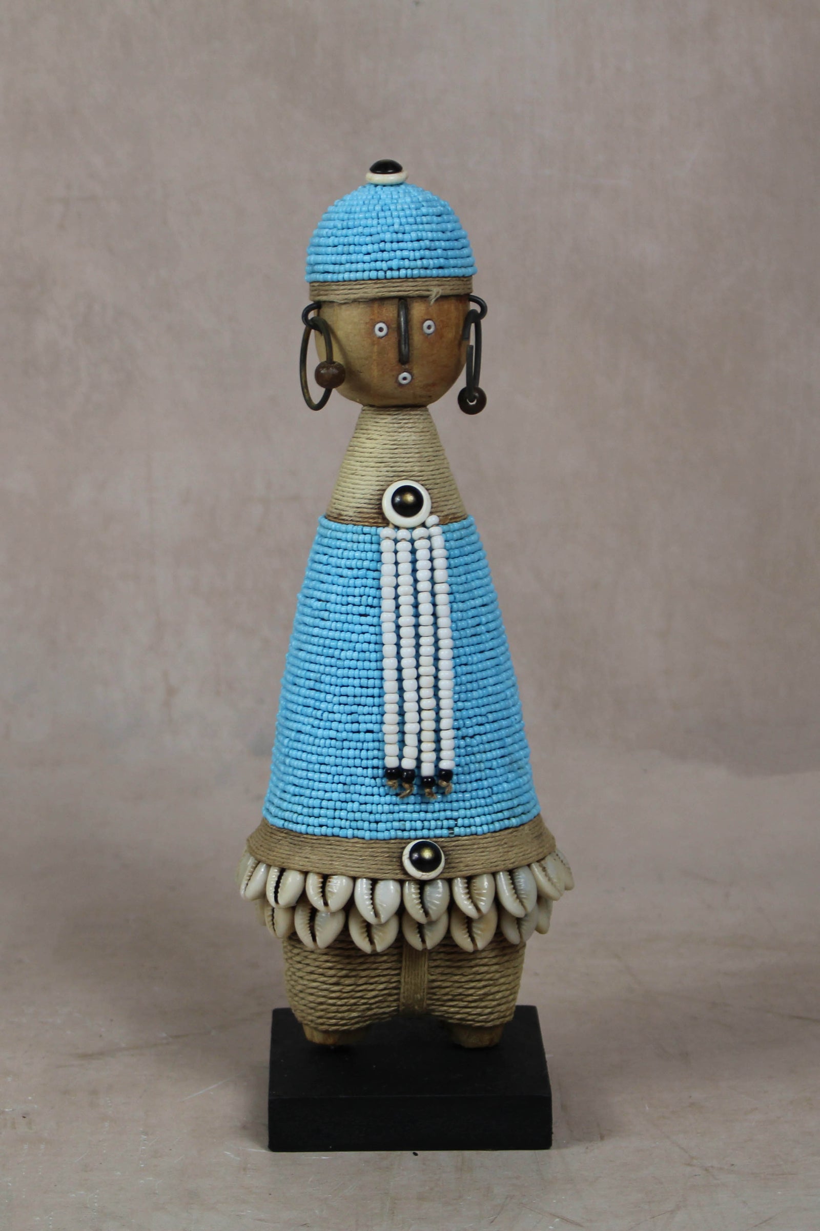 Hand-carved blue beaded Namji doll from Cameroon