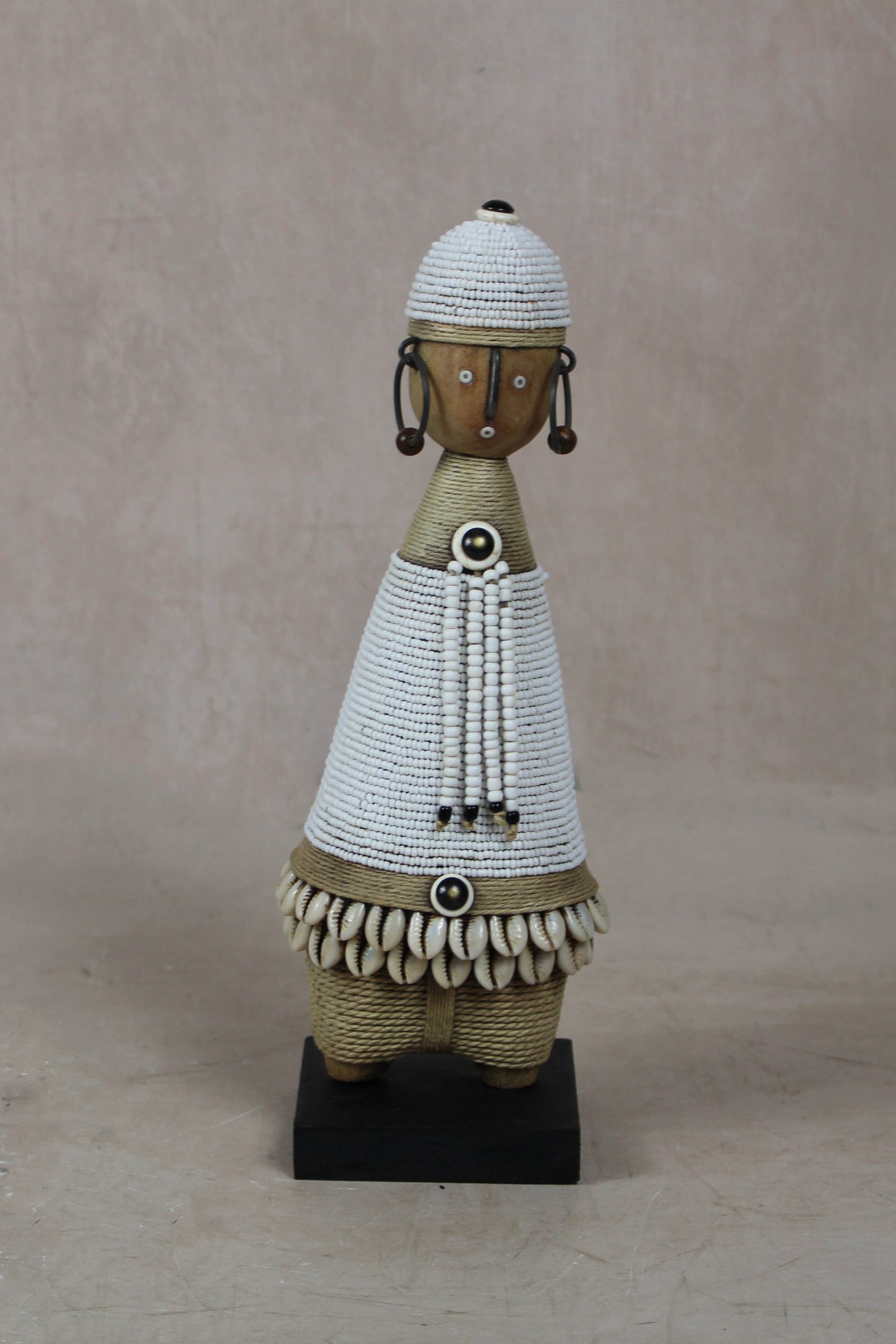 Hand-carved white beaded Namji doll from Cameroon