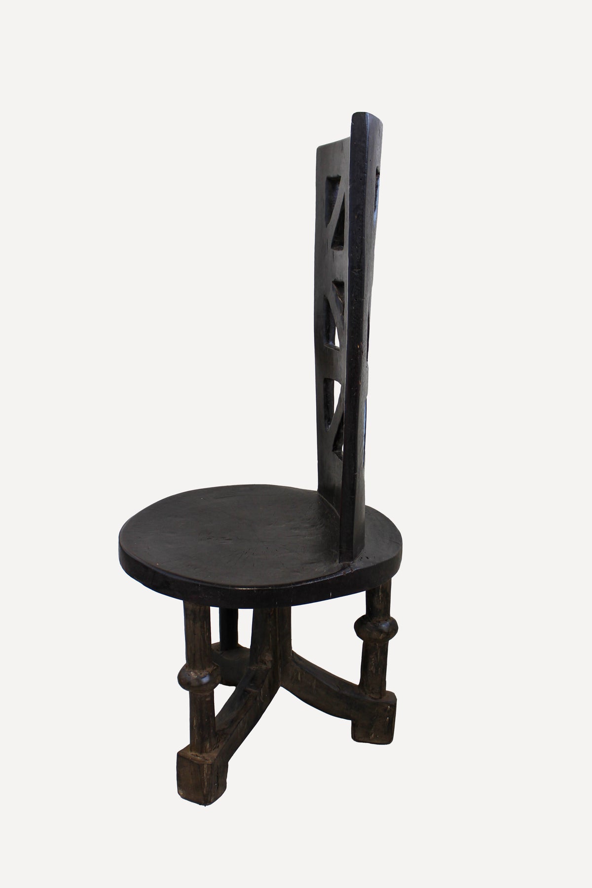 Makonde carved wooden chair, Tanzania — side view