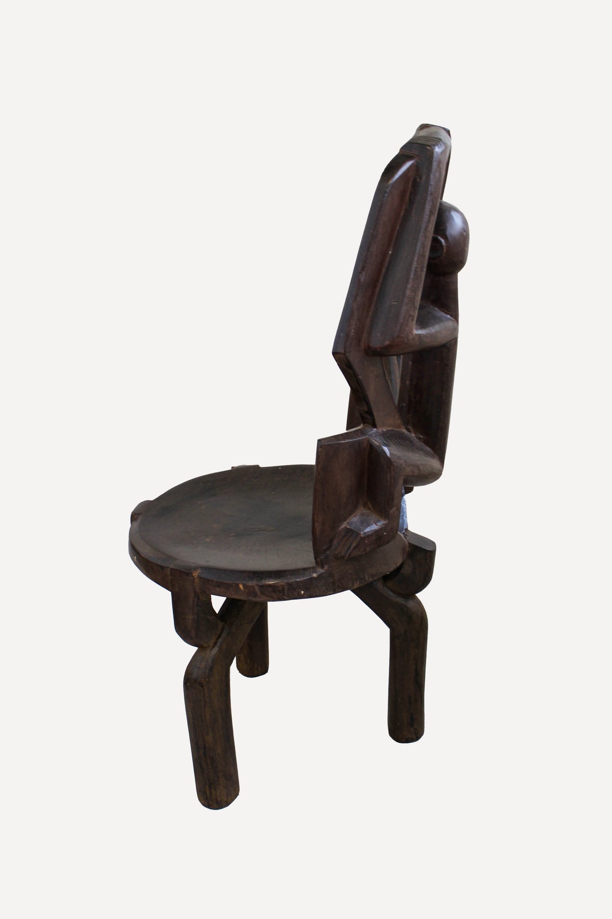 Makonde carved wooden chair, Tanzania — side view
